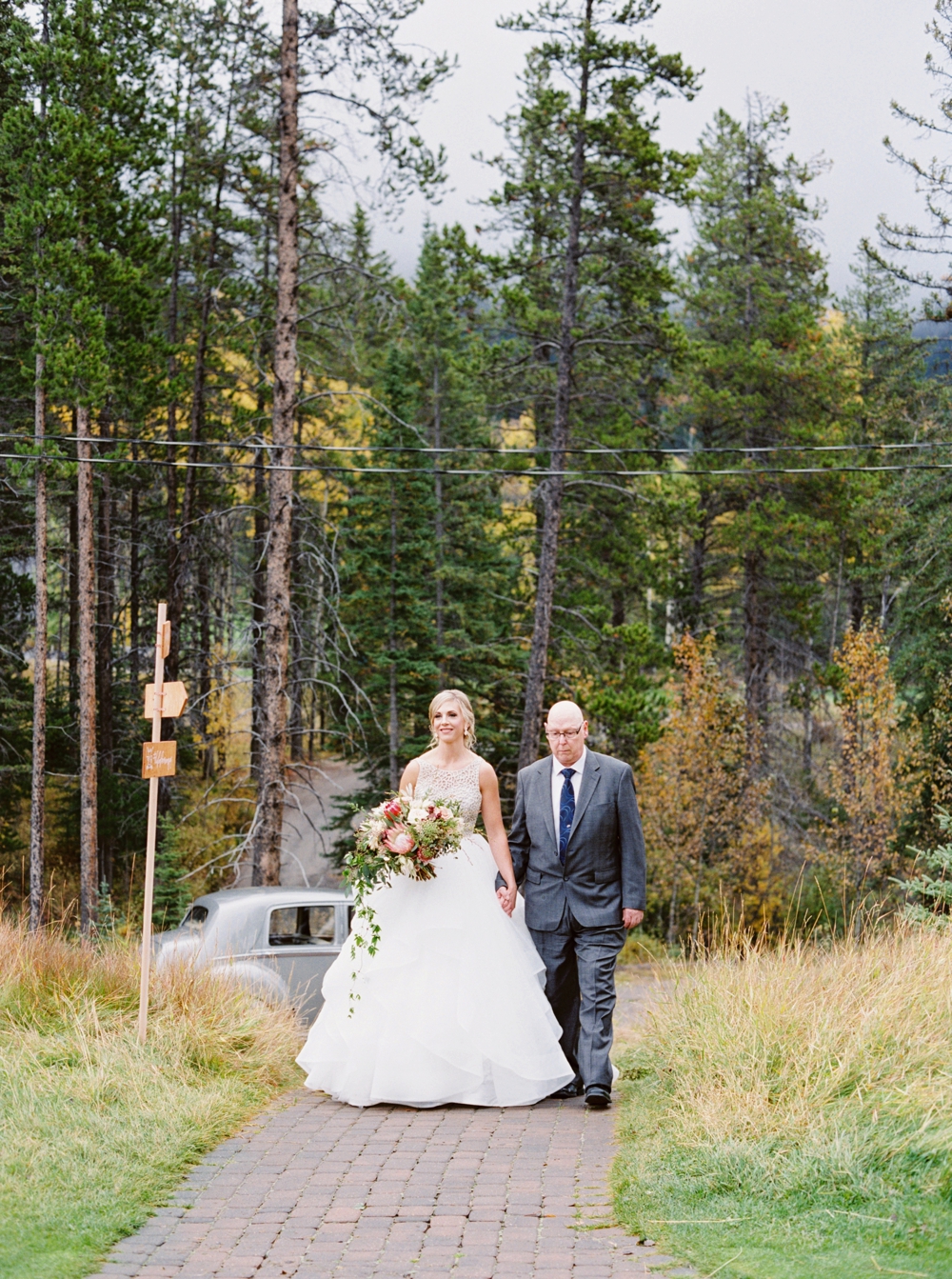 Calgary Wedding Photographers | Canmore Silvertip Resort Wedding | Outdoor Ceremony | California Rustic Boho Wedding