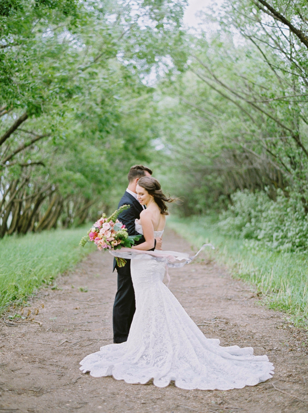 Edmonton wedding photographers | stunning overhanging tree location | pink bridal bouquet | galia lahav wedding dress inspiration | Justine Milton fine art film wedding photographers