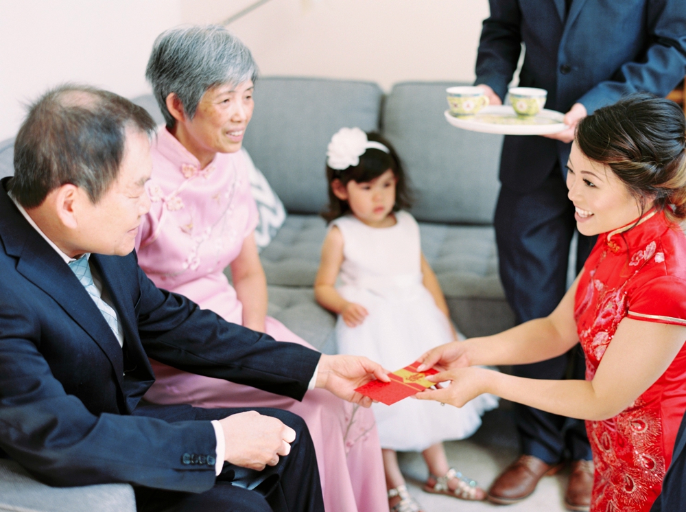 Asian tea ceremony wedding celebration | Justine milton fine art wedding photographers | calgary wedding at the lake house