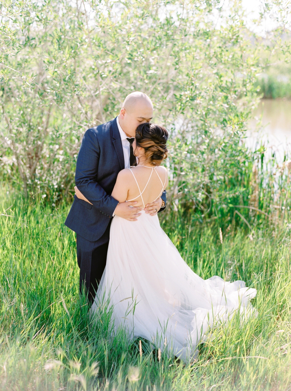 Bride and groom portraits | BHLDN wedding dress | Justine milton fine art wedding photographers | calgary wedding at the lake house