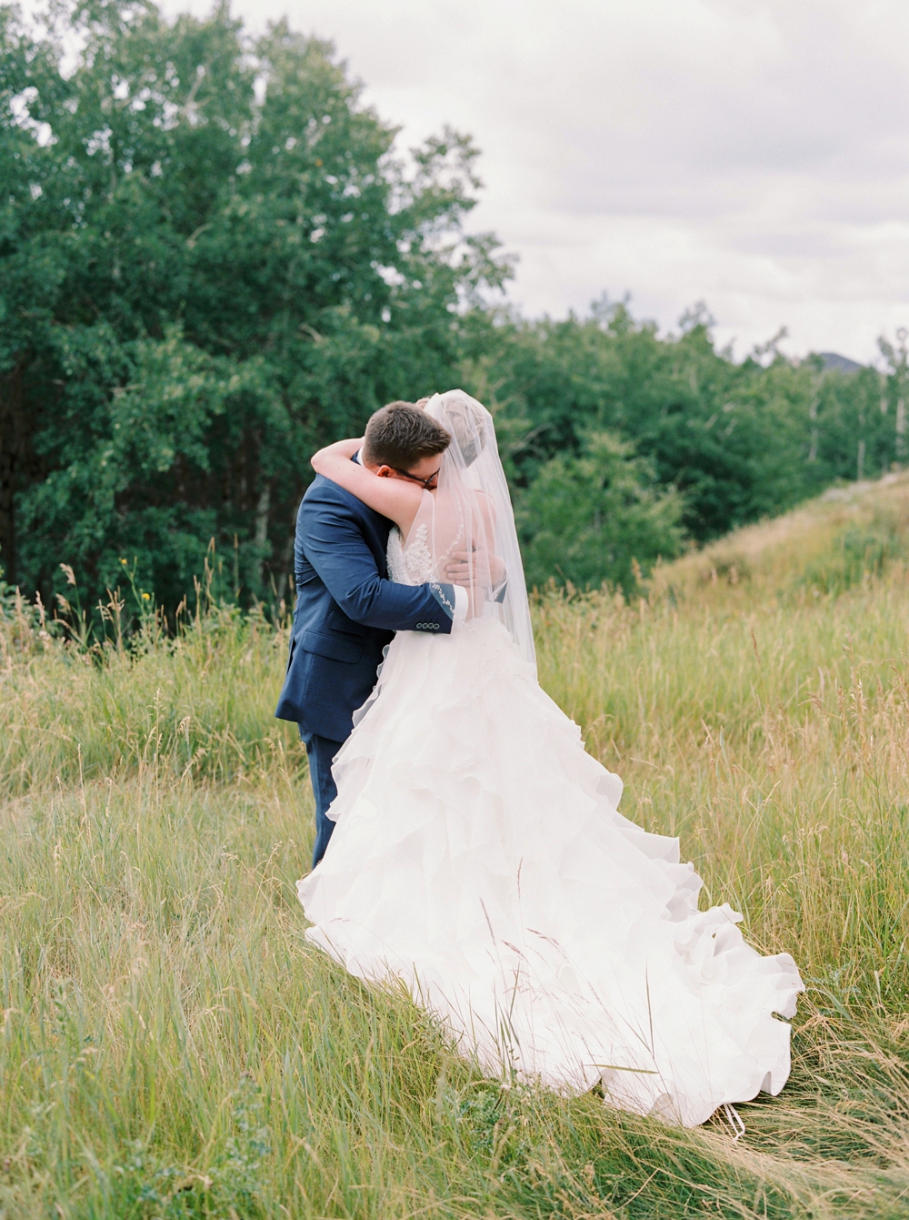 Calgary wedding photographers | The lake house wedding | First Look | Justine Milton Photography