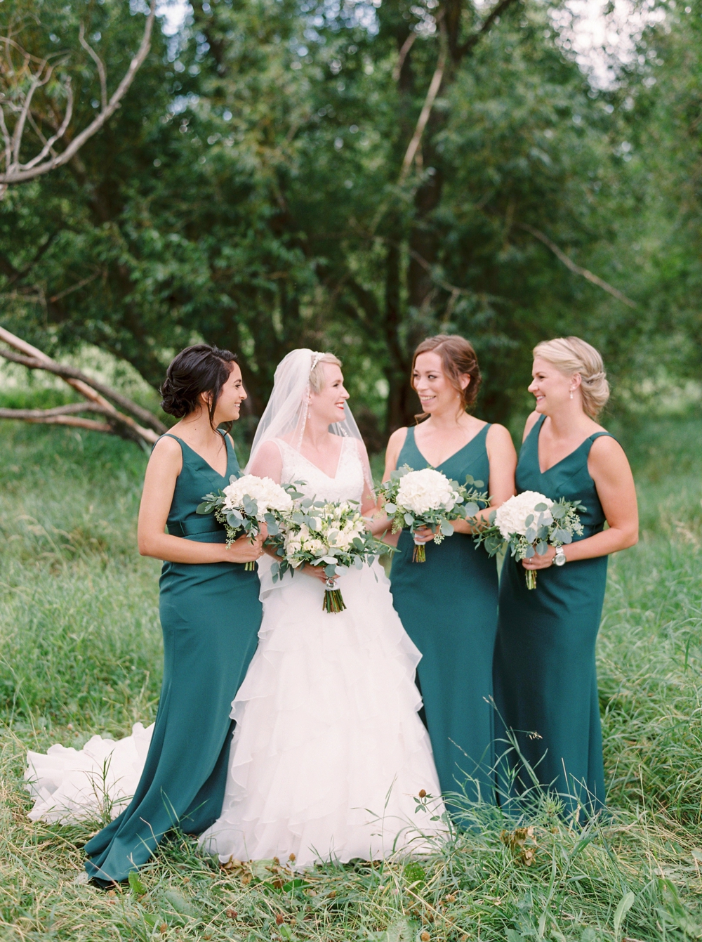 Calgary wedding photographers | The lake house wedding | Wedding Party Bridesmaids Emerald Green Dresses | Justine Milton Photography
