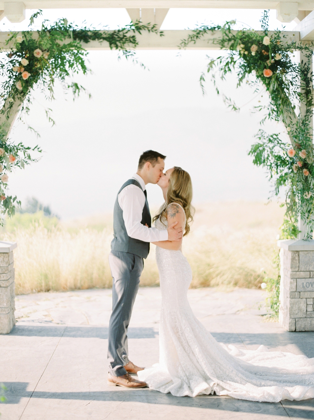 Sanctuary Gardens Kelowna Wedding | Elopement Photography | Wedding Ceremony first kiss | Justine Milton Fine Art Film Wedding Photographers