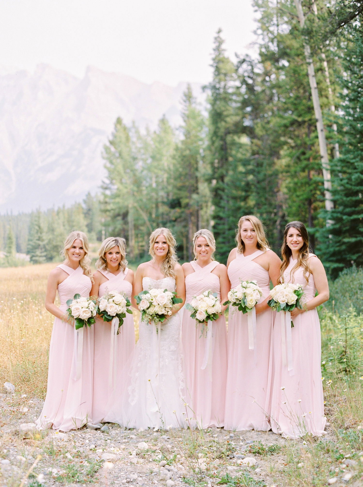 Fairmont Banff Springs Hotel wedding photographers | Justine Milton Fine Art Film Photography | Bridesmaids blush pink dresses