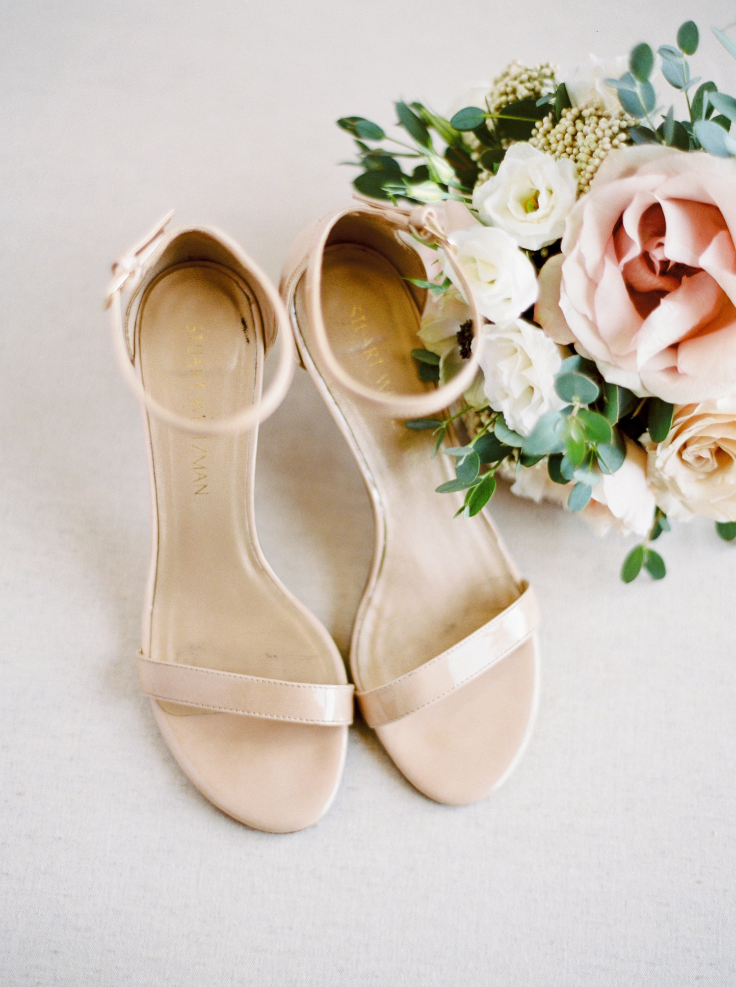 Kelowna wedding photographers | hotel eldorado wedding photographer | justine milton fine art film photography | adding shoes | wedding details