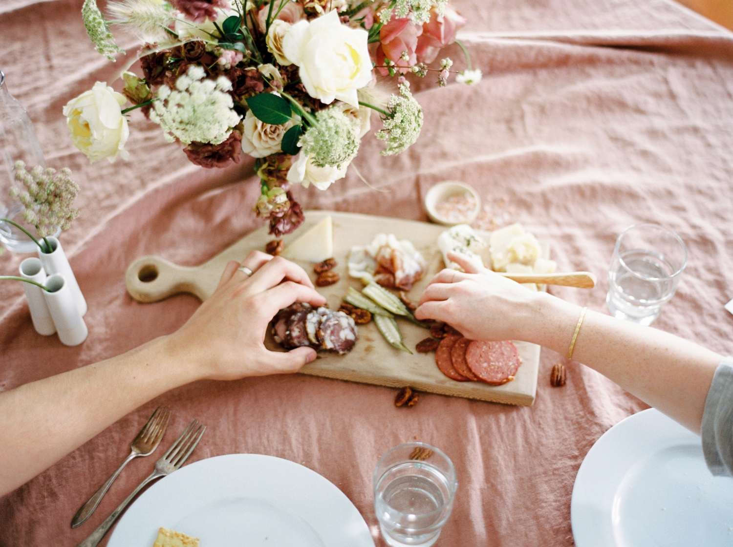 Charleston wedding photographer | anniversary dinner | fine art film photography | Calgary Wedding Photographers | Calgary couples photographer | Justine Milton Photography | flowers | table setting