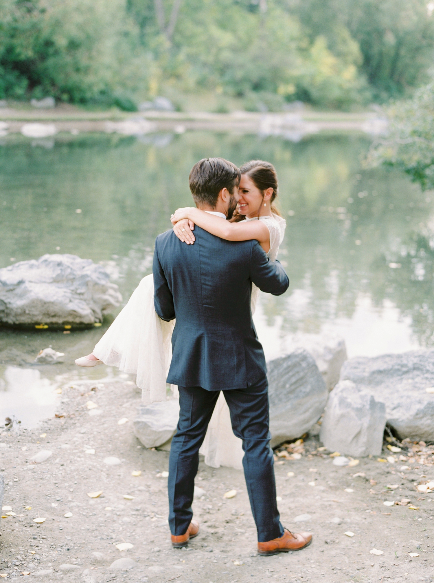 Calgary wedding photographers | fine art film | Justine Milton Photography | wedding inspiration | wedding dress | bride and groom portraits | river