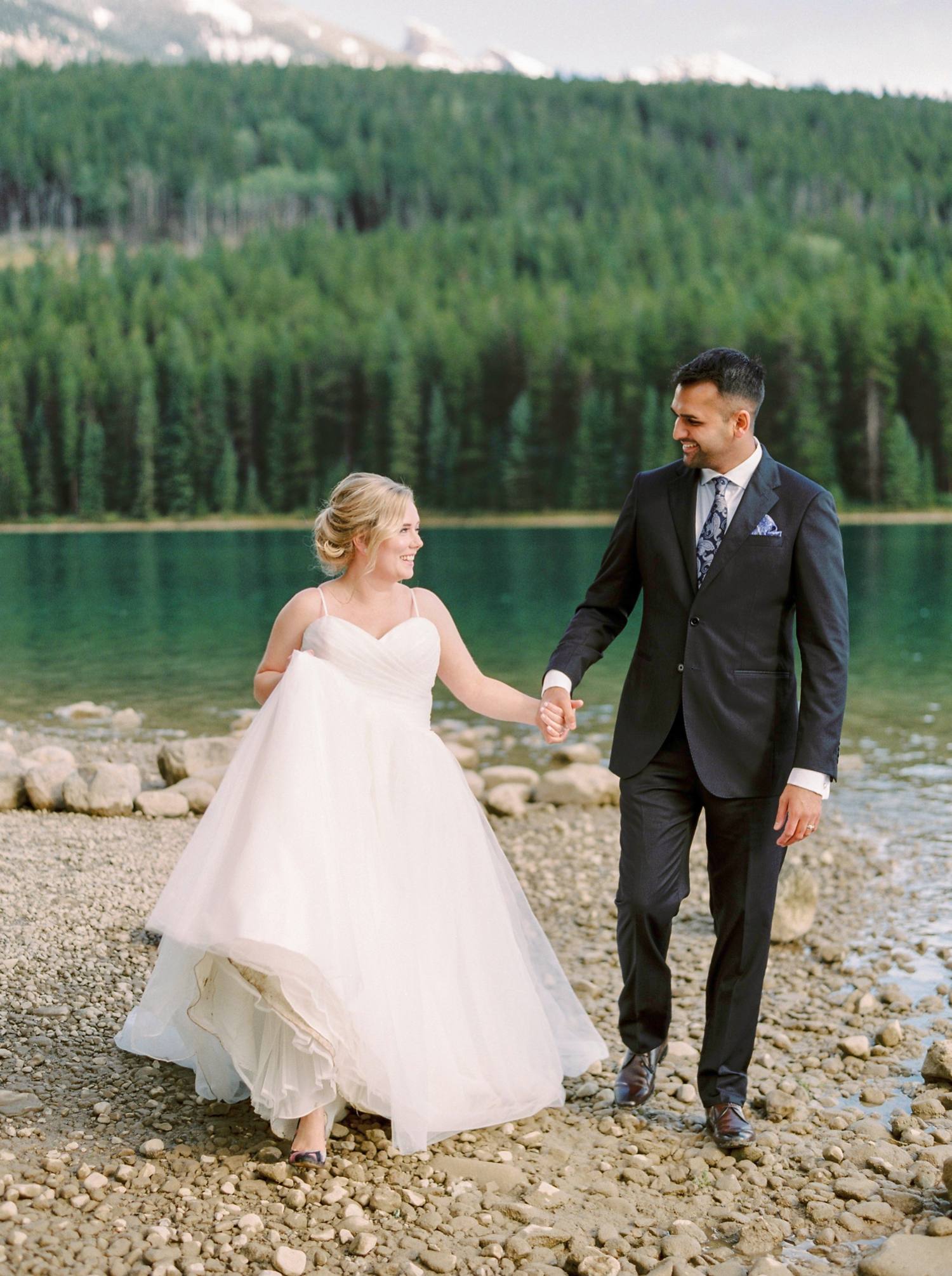 Calgary wedding photographers | banff wedding photographers | fine art film | Justine Milton Photography | wedding vows | elopement photographers | bride and groom portraits | moraine lake