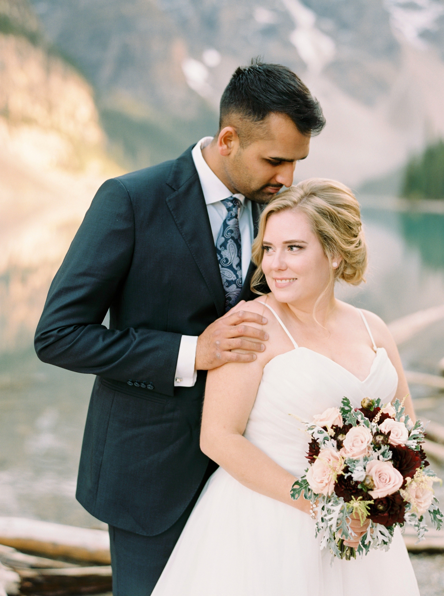 Calgary wedding photographers | banff wedding photographers | fine art film | Justine Milton Photography | wedding vows | elopement photographers | bride and groom portraits | moraine lake