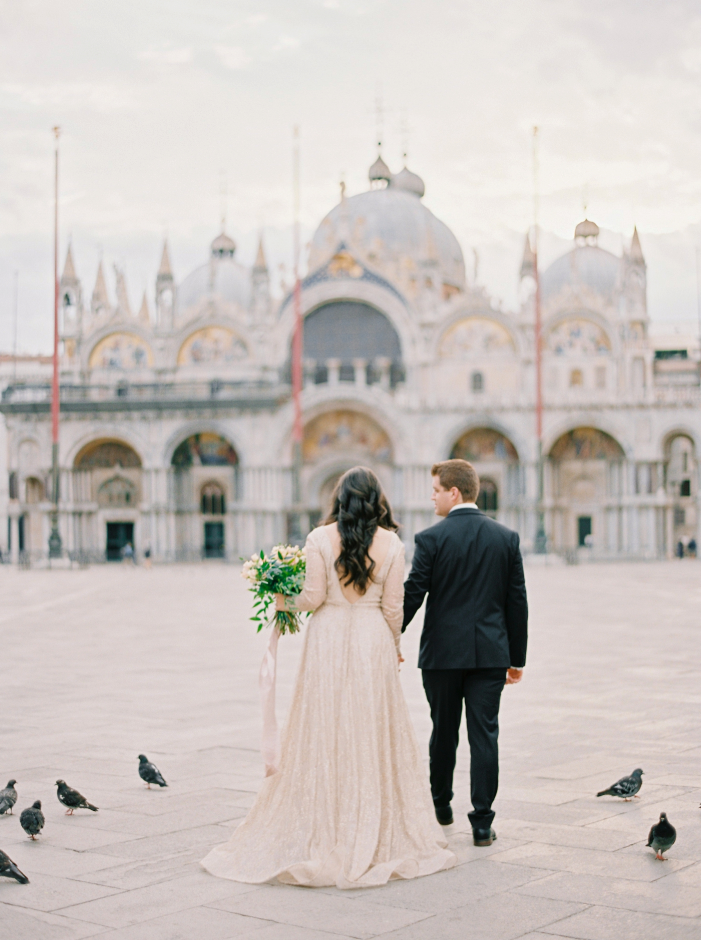 Venice italy wedding photographers | long sleeve wedding dress | italy vow renewal | justine milton fine art film photographer | bride and groom portraits San Marco Square