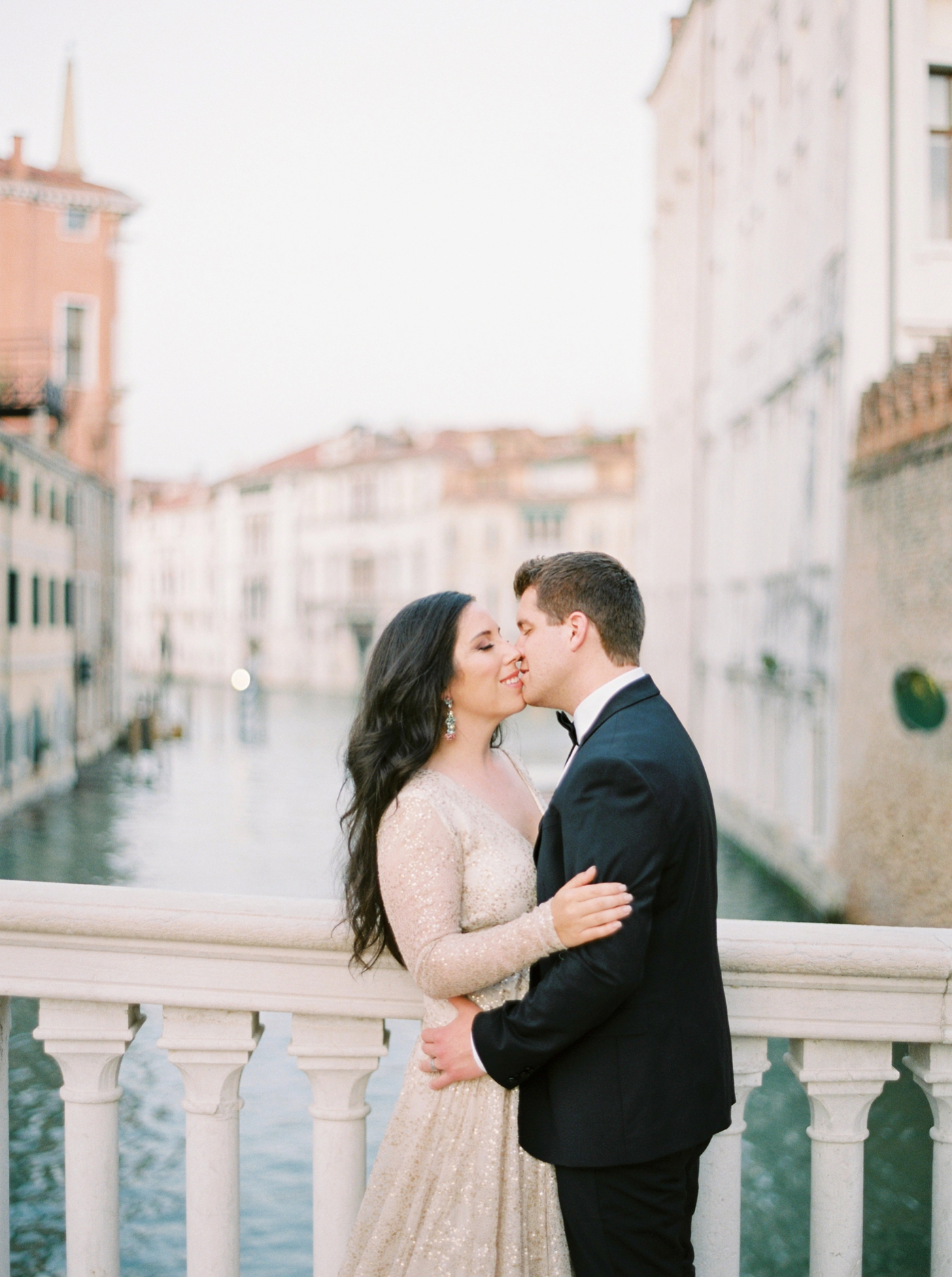 Venice italy wedding photographers | long sleeve wedding dress | italy vow renewal | justine milton fine art film photographer | bride and groom portraits in venice canals