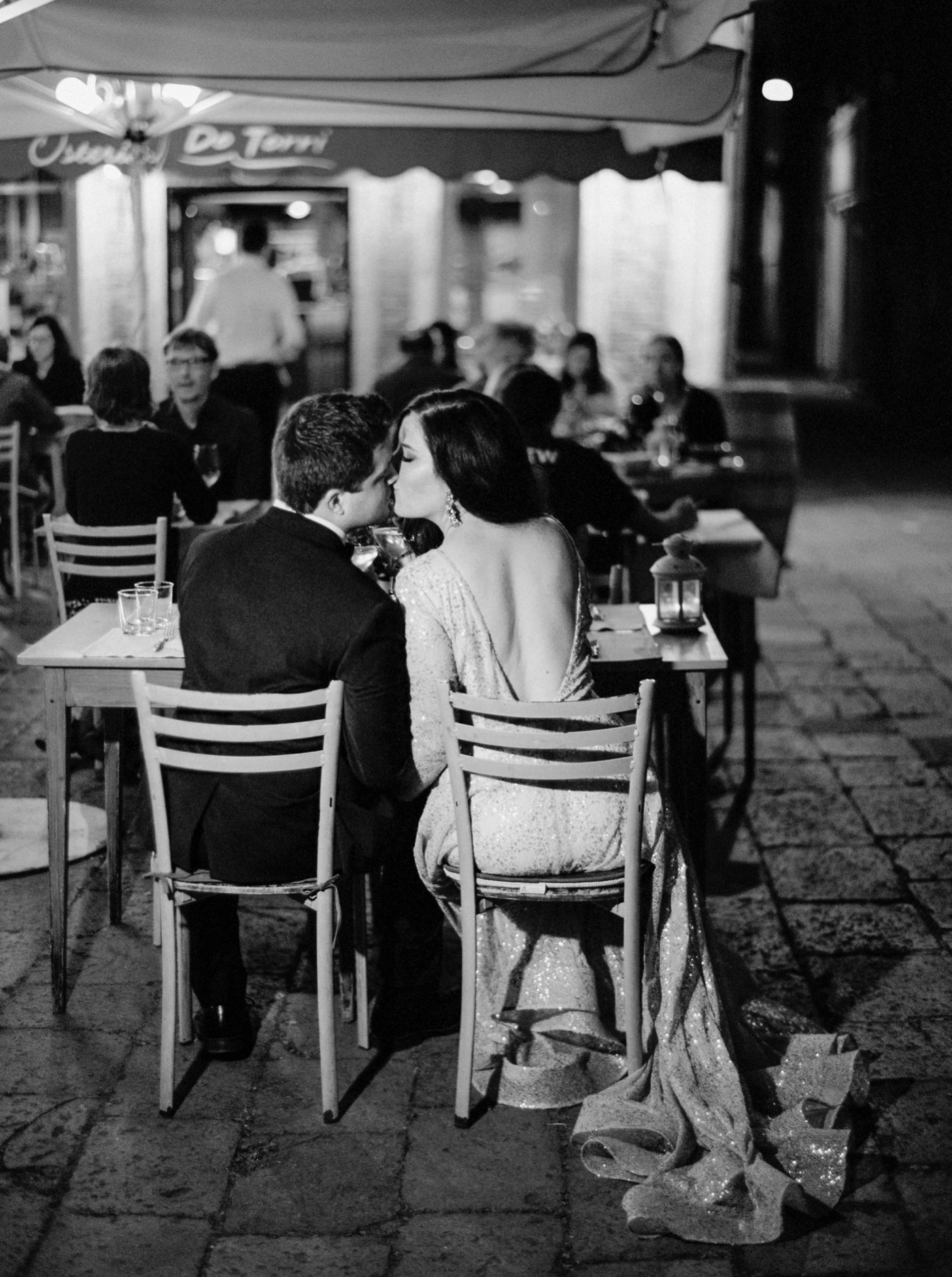 Venice italy wedding photographers | long sleeve wedding dress | italy vow renewal | justine milton fine art film photographer | bride and groom romantic dinner portraits