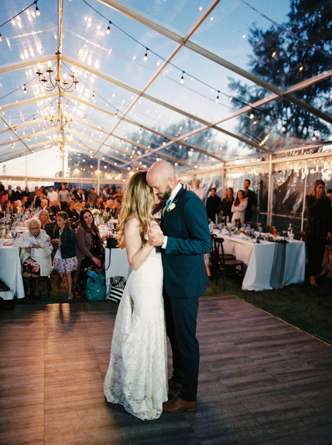 Calgary wedding photographers | The Gathered Farm Wedding | Justine milton fine art film photographer | clear tent wedding reception first dances