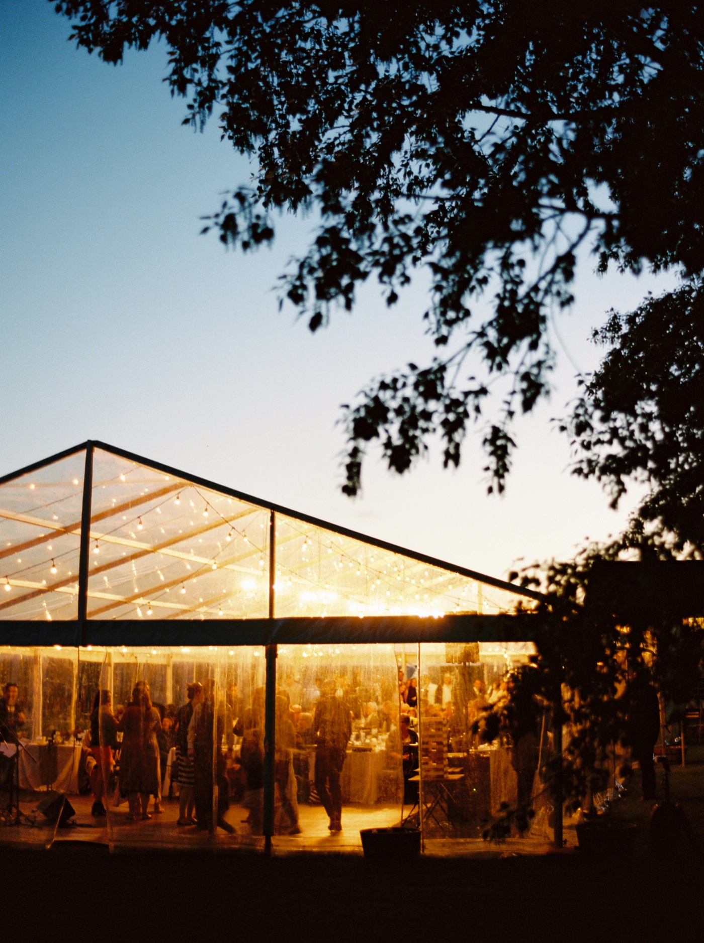 Calgary wedding photographers | The Gathered Farm Wedding | Justine milton fine art film photographer | clear tent wedding reception first dances