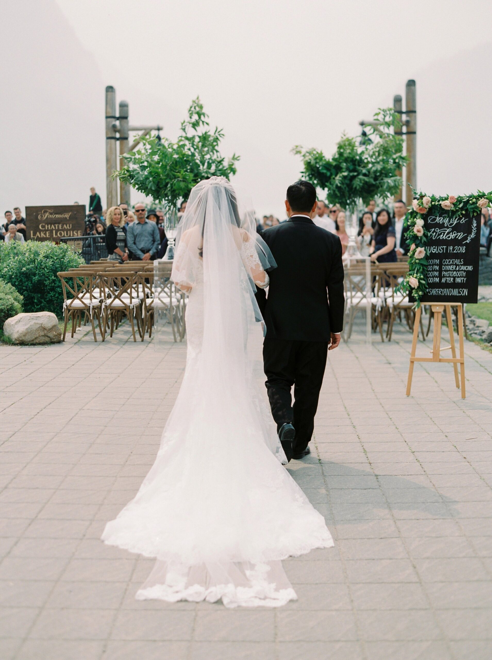  Lake Louise wedding photographers | Justine milton photography | fine art film destination wedding photographer | wedding ceremony bride and dad 