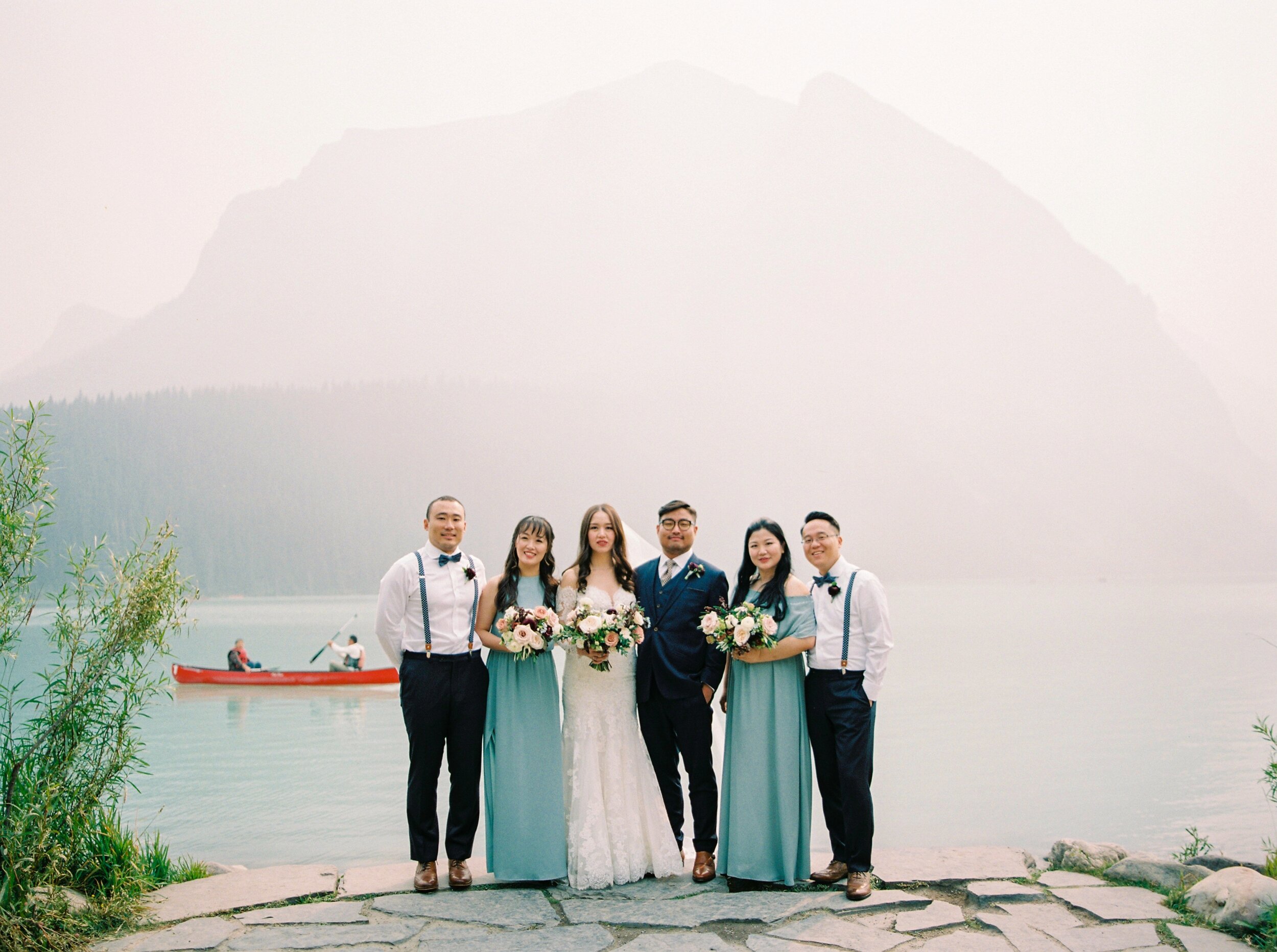  Lake Louise wedding photographers | Justine milton photography | fine art film destination wedding photographer | fairmont chateau lake louise wedding party portrait 