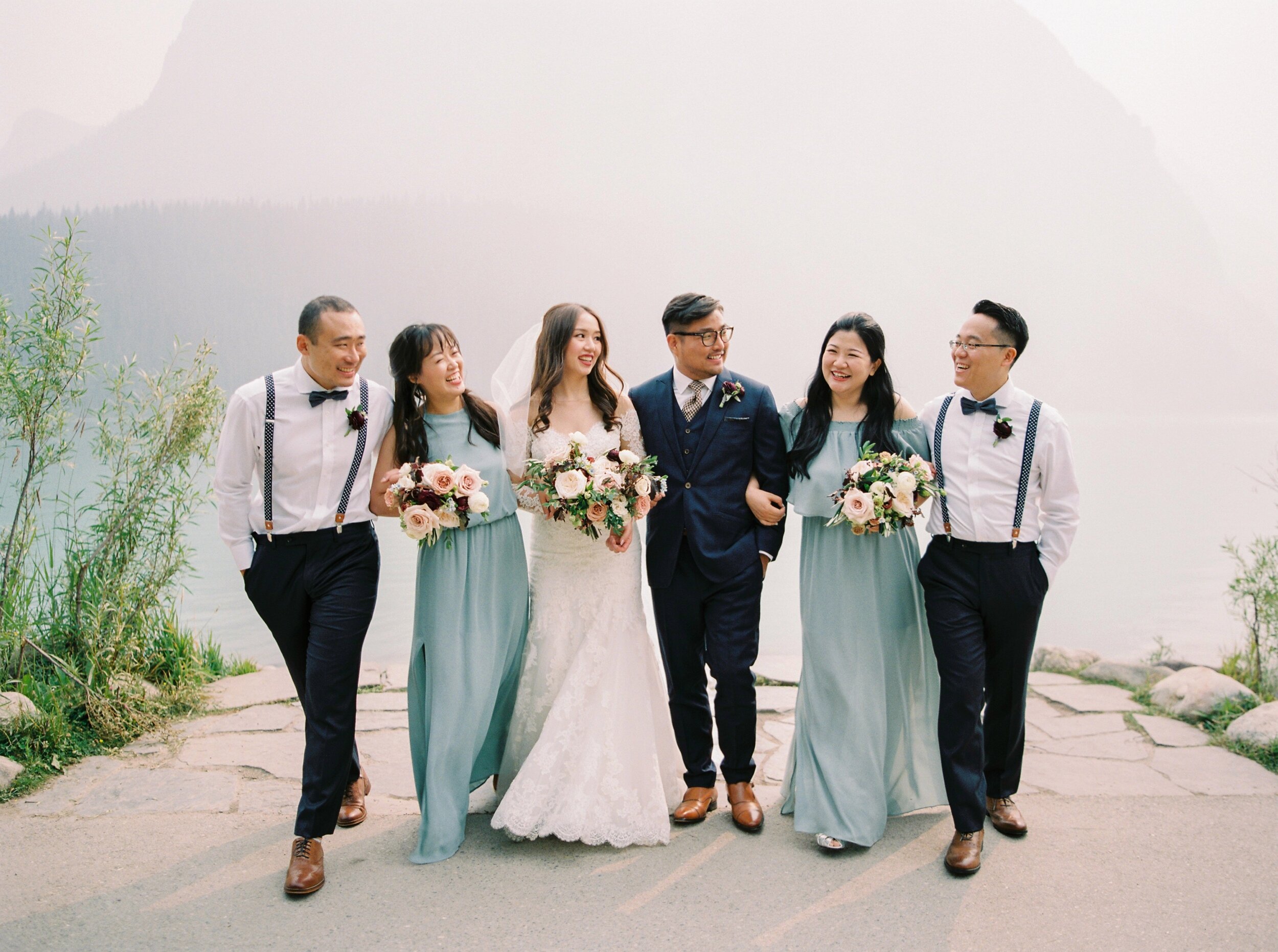 Lake Louise wedding photographers | Justine milton photography | fine art film destination wedding photographer | fairmont chateau lake louise wedding party portrait 