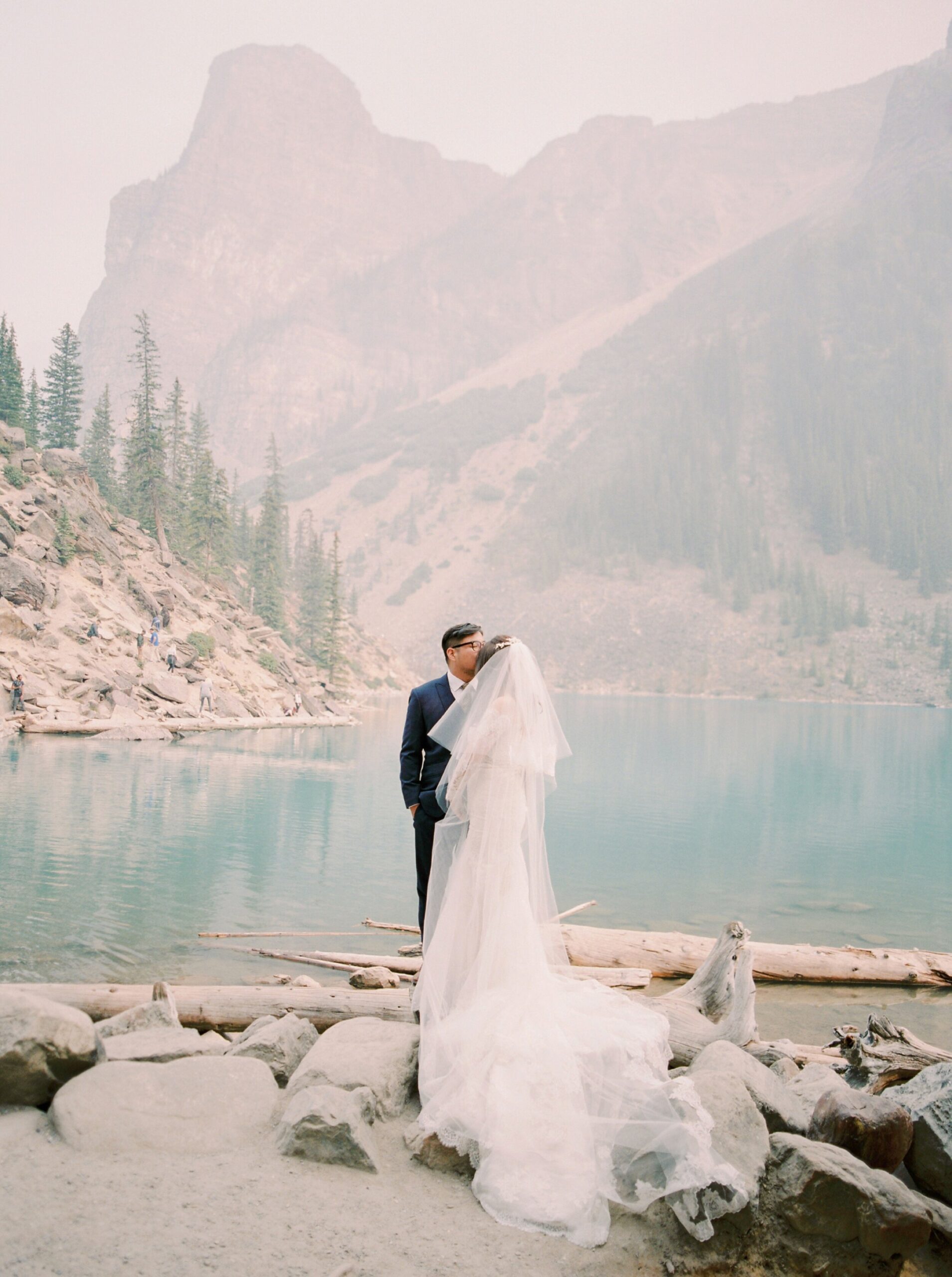  Lake Louise wedding photographers | Justine milton photography | fine art film destination wedding photographer | fairmont chateau lake louise bride and groom portrait 