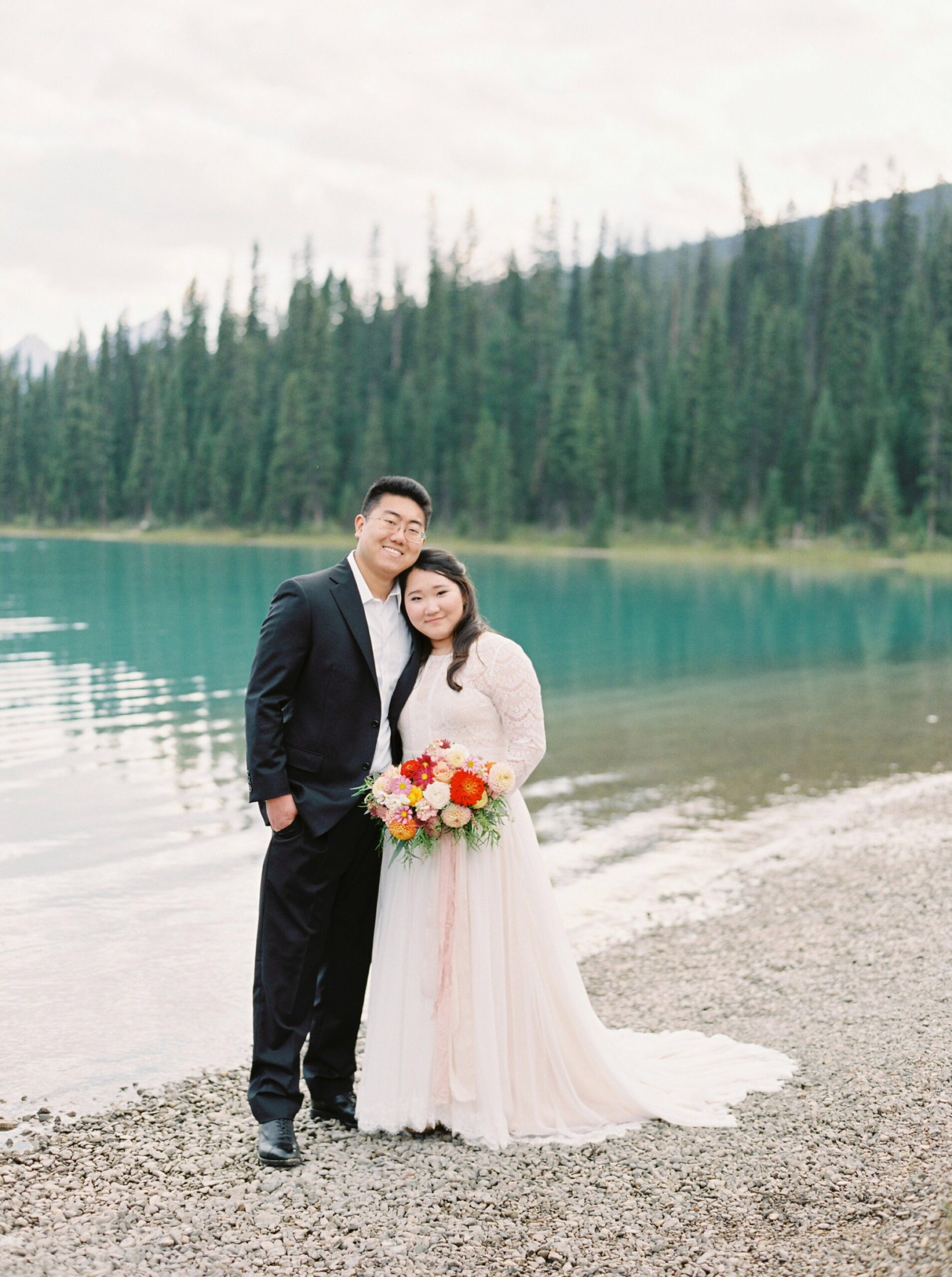  Banff wedding photographers | Justine milton photography | fine art film destination wedding photographer | Emerald Lake Lodge Elopement bride and groom 