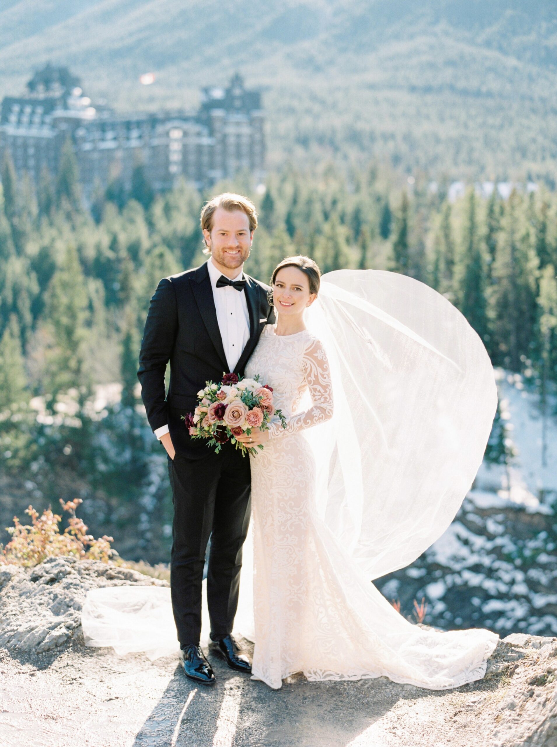  Bride and groom pose ideas | winter wedding |long sleeve lace wedding dress inspiration | banff springs wedding photographer 