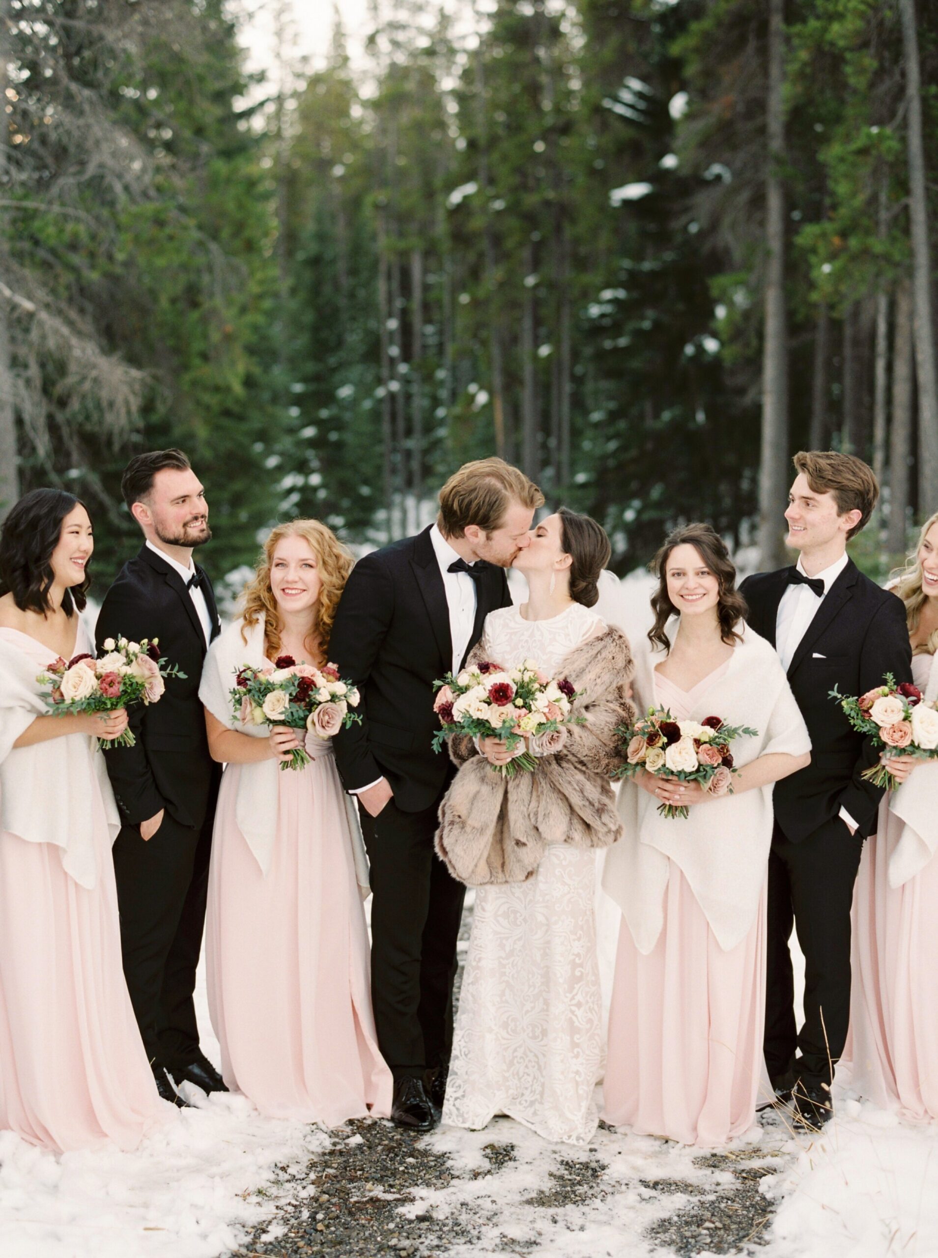 Blush winter bridesmaids outfits with fur stolls and modern pops of color bridal bouquet 