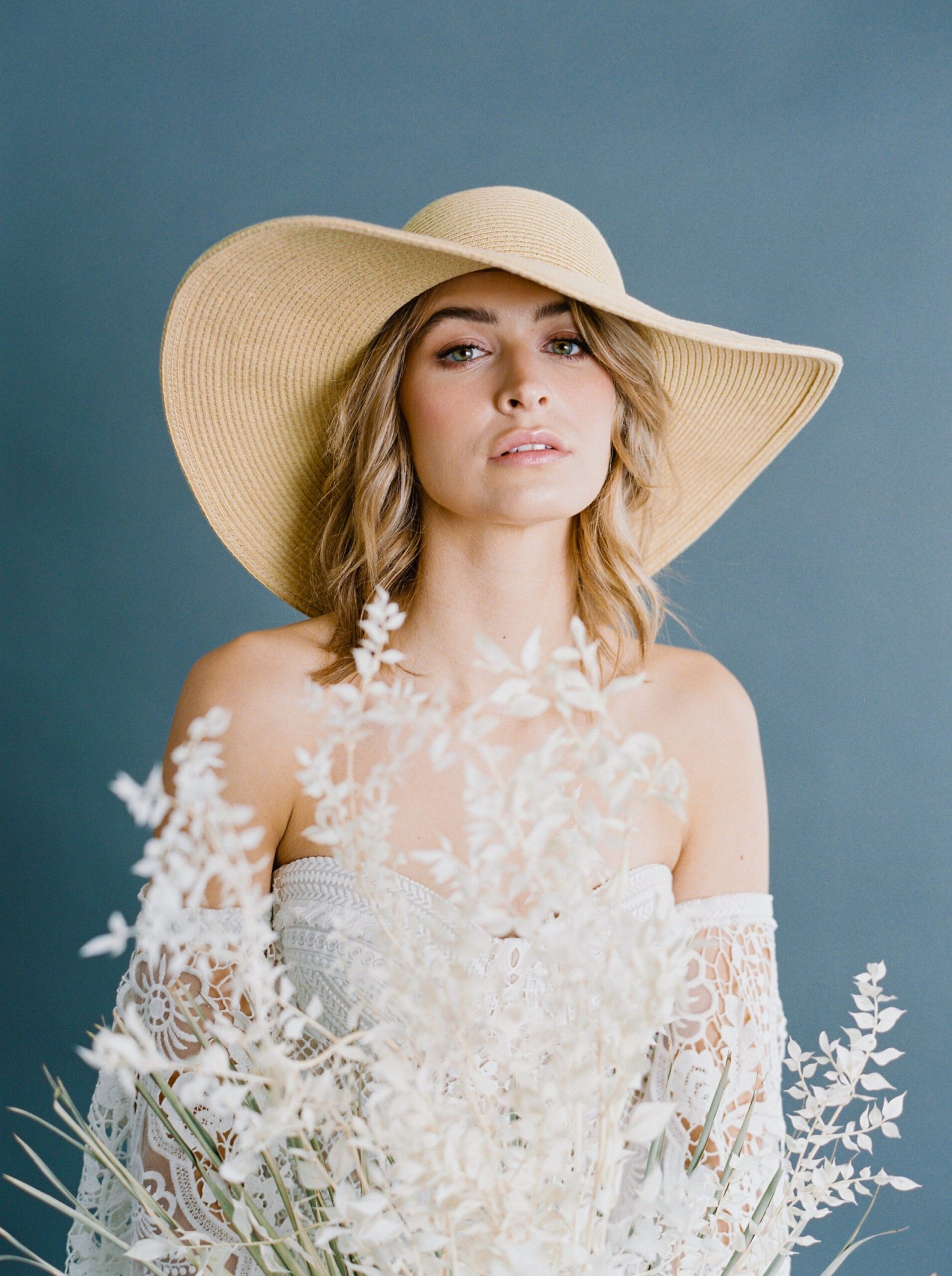  boho style editorial fashion bridal gown | bride with big floppy hat | fine art film photographer | calgary wedding photography 