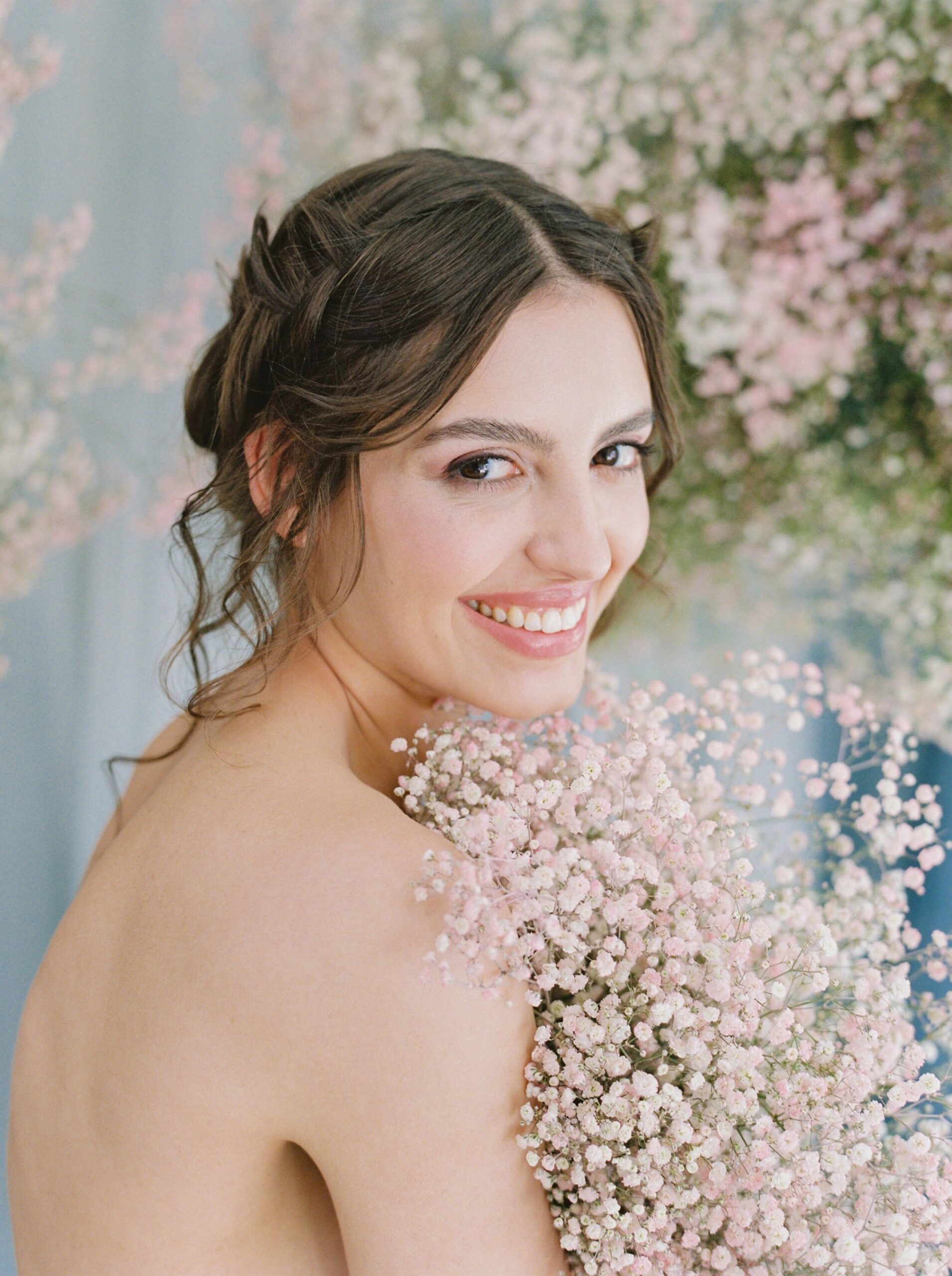  babys breath floral installation with blu efabric watercolor backdrop | fashion wedding editorial | poofy tulle skirt and wedding dress | fine art film photographer Calgary wedding photographers Justine Milton 