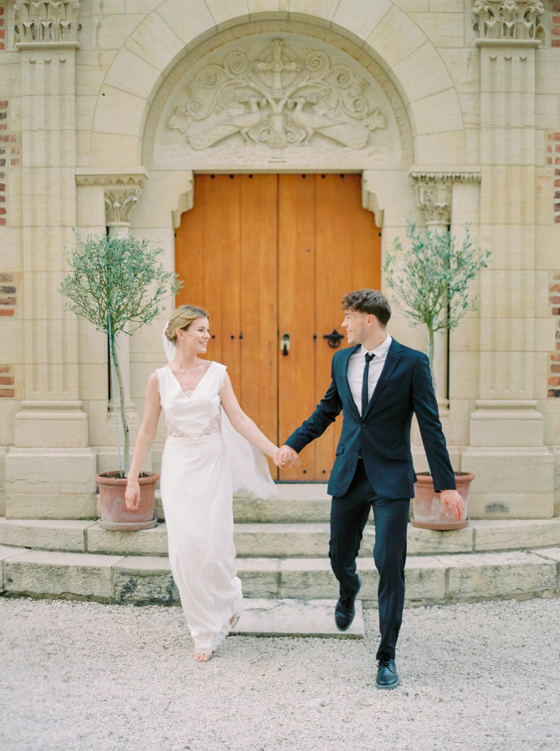  French chapel with bride and groom Chateau wedding | Paris wedding photographer | fine art film photographer 