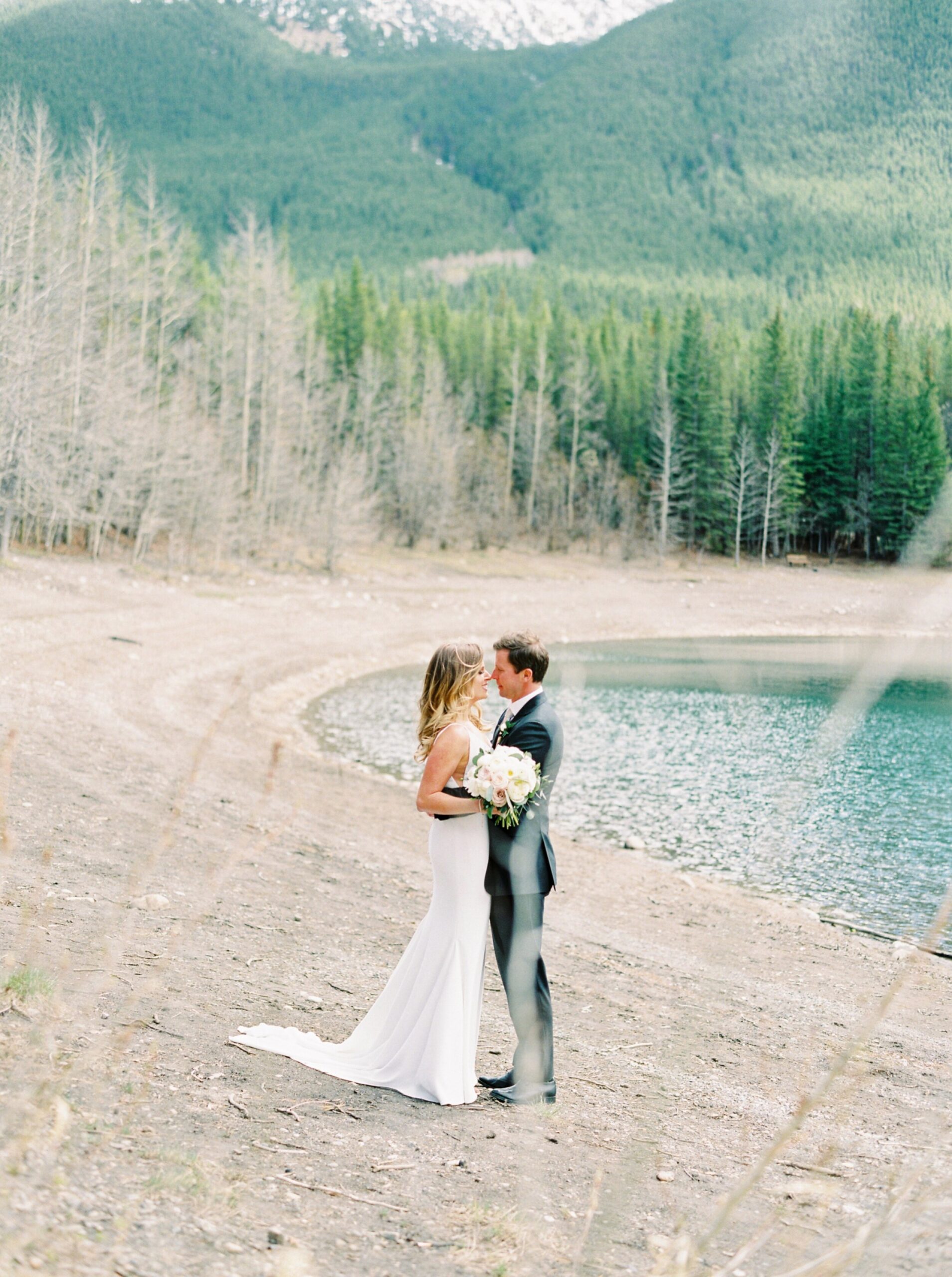  wedding couple pose ideas stunning mountain wedding | Kananaskis wedding | fine art film Banff wedding photographer 
