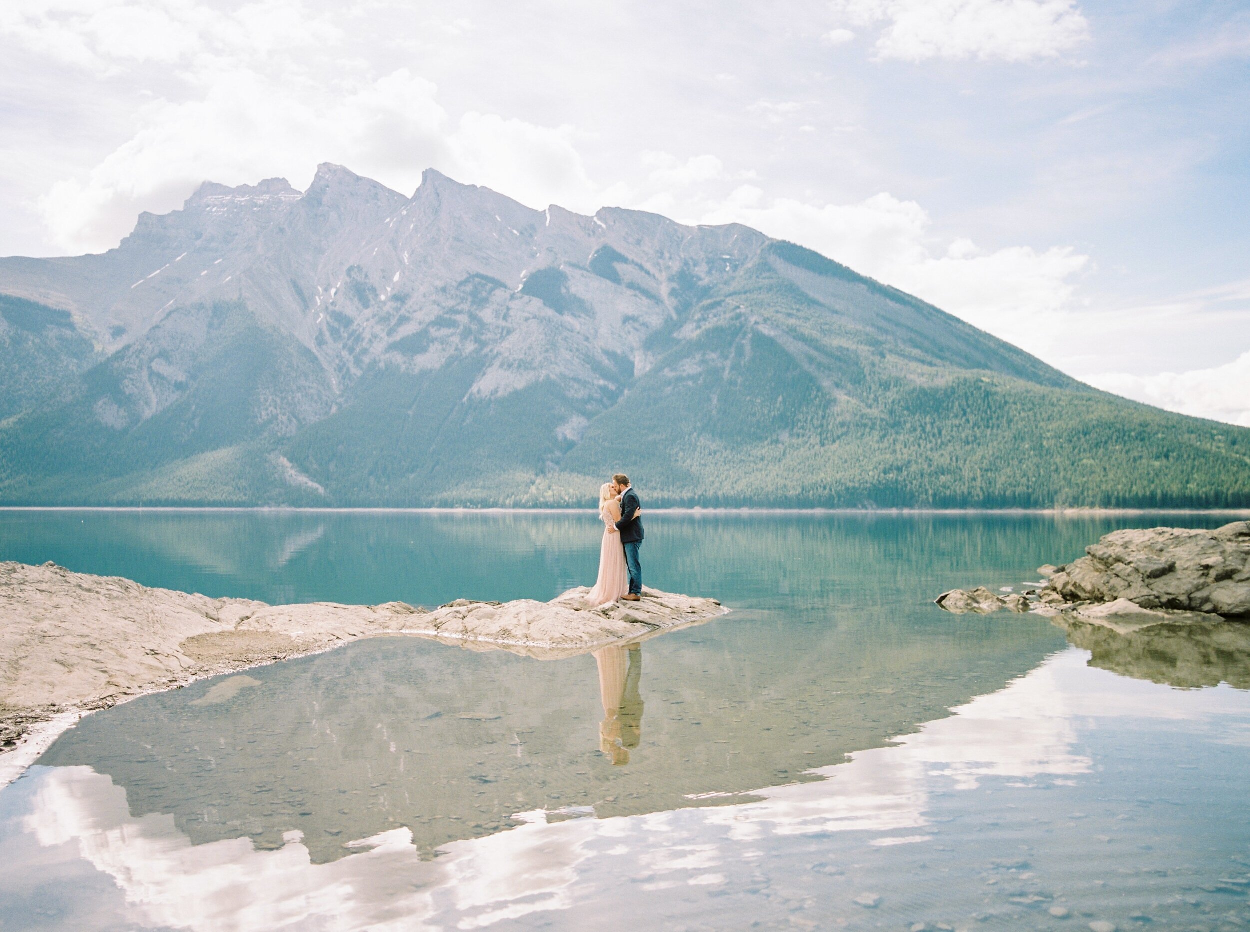  Banff wedding photographer | anniversary session Lake Minnewanka  | couples pose inspiration | justine milton fine art film photographer 