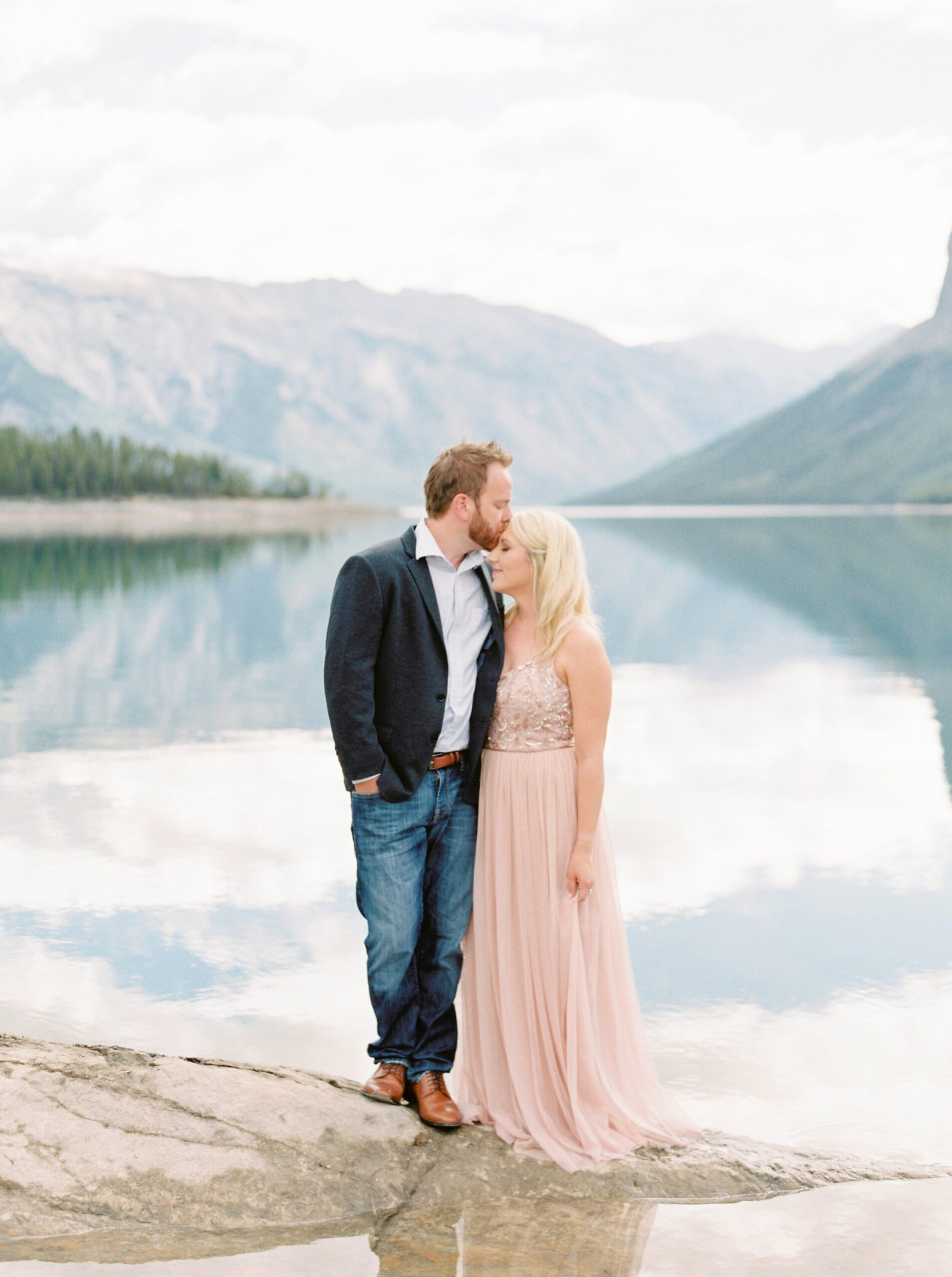  Banff wedding photographer | anniversary session Lake Minnewanka  | couples pose inspiration | justine milton fine art film photographer 