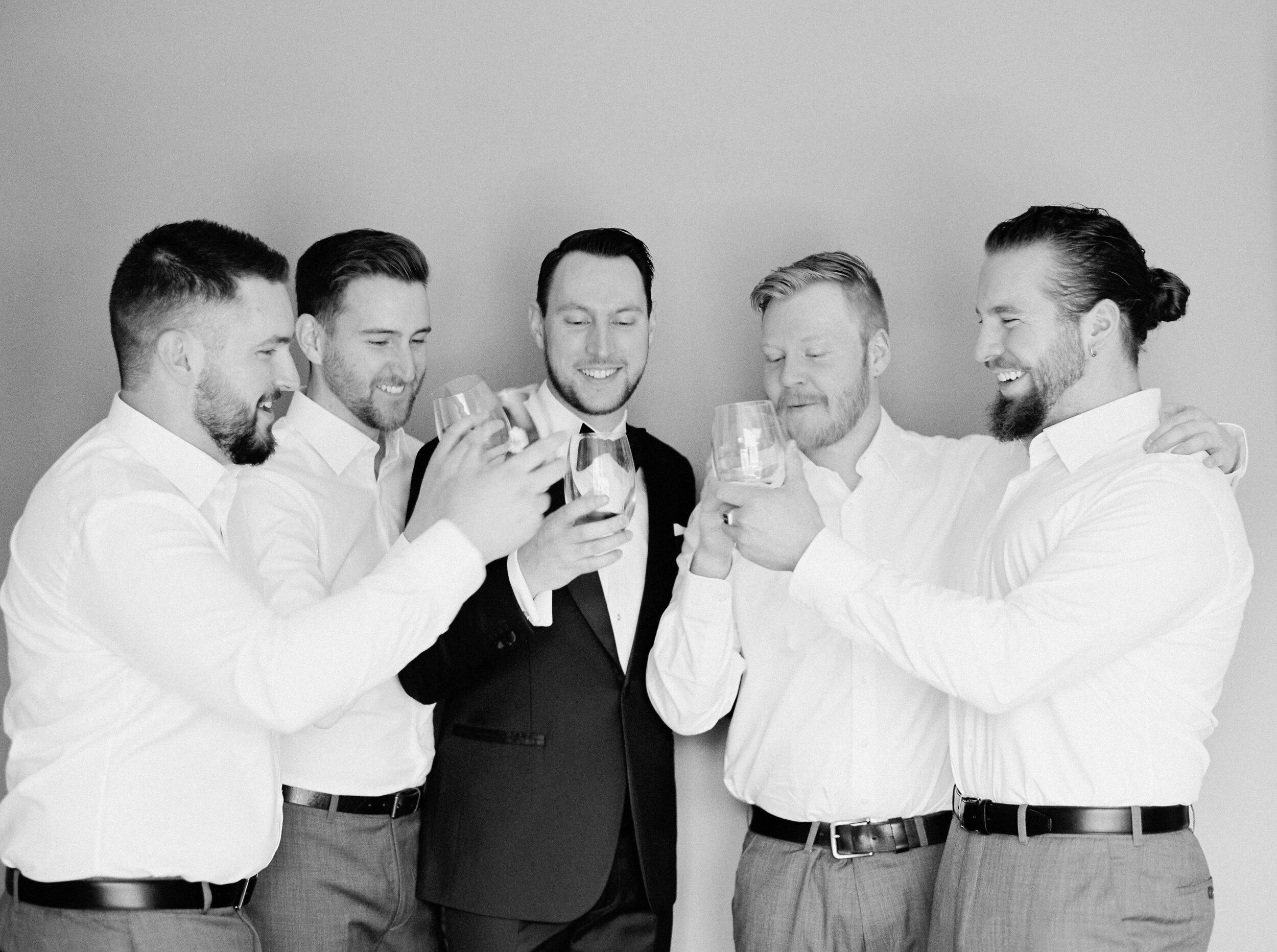  groom & groomsmen getting ready toast | Deane House Wedding | Calgary photographer | fine art film photography Justine Milton 
