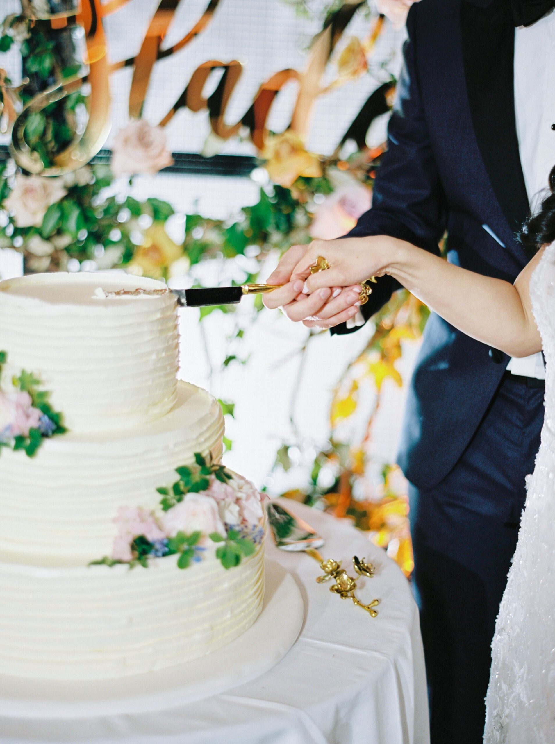Tiered cake cutting | Brooklyn Botanic Garden NYC Wedding Photographers