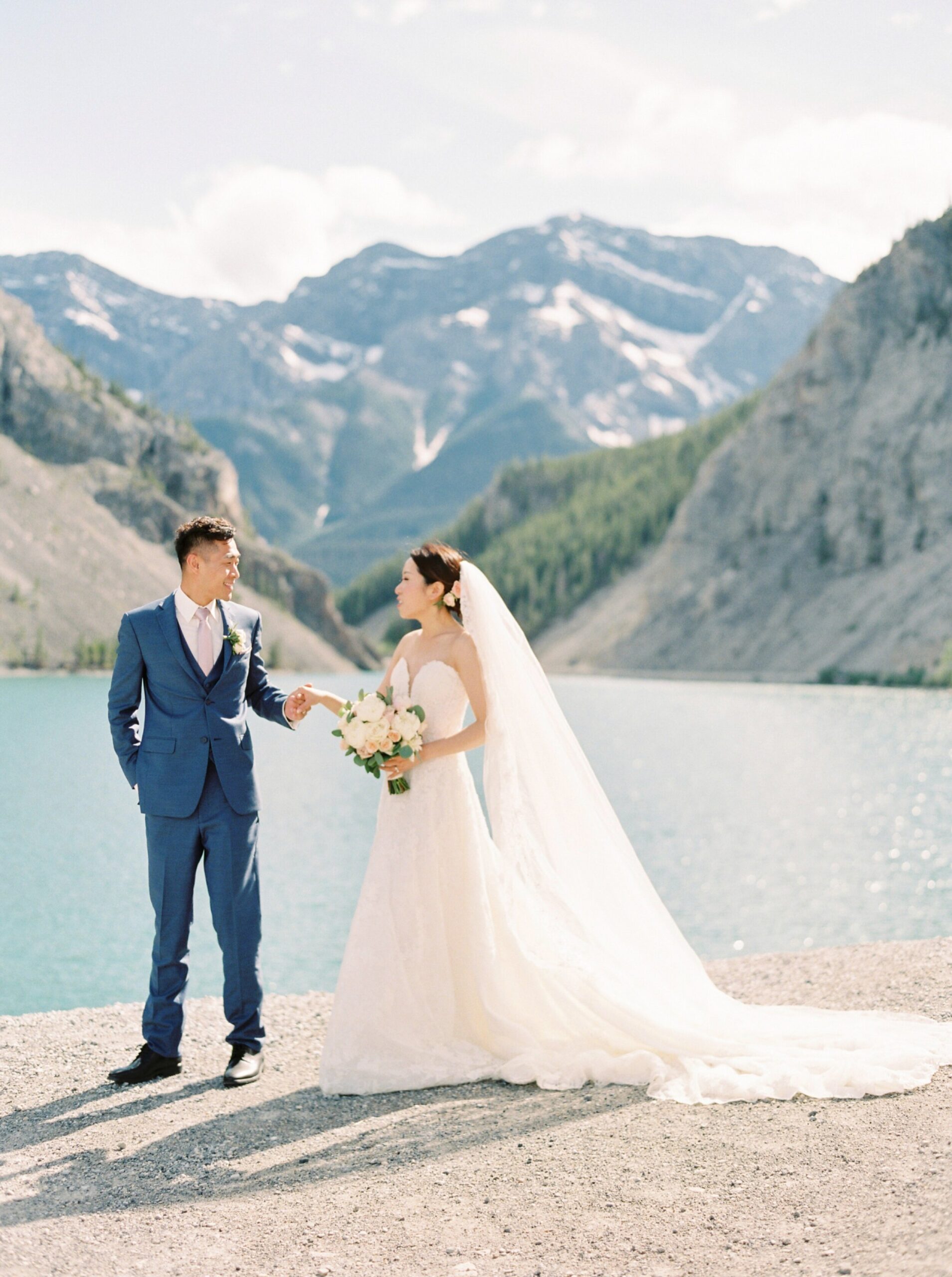  bride and groom portraits | pose ideas in the mountains | silvertip canmore wedding photographers 