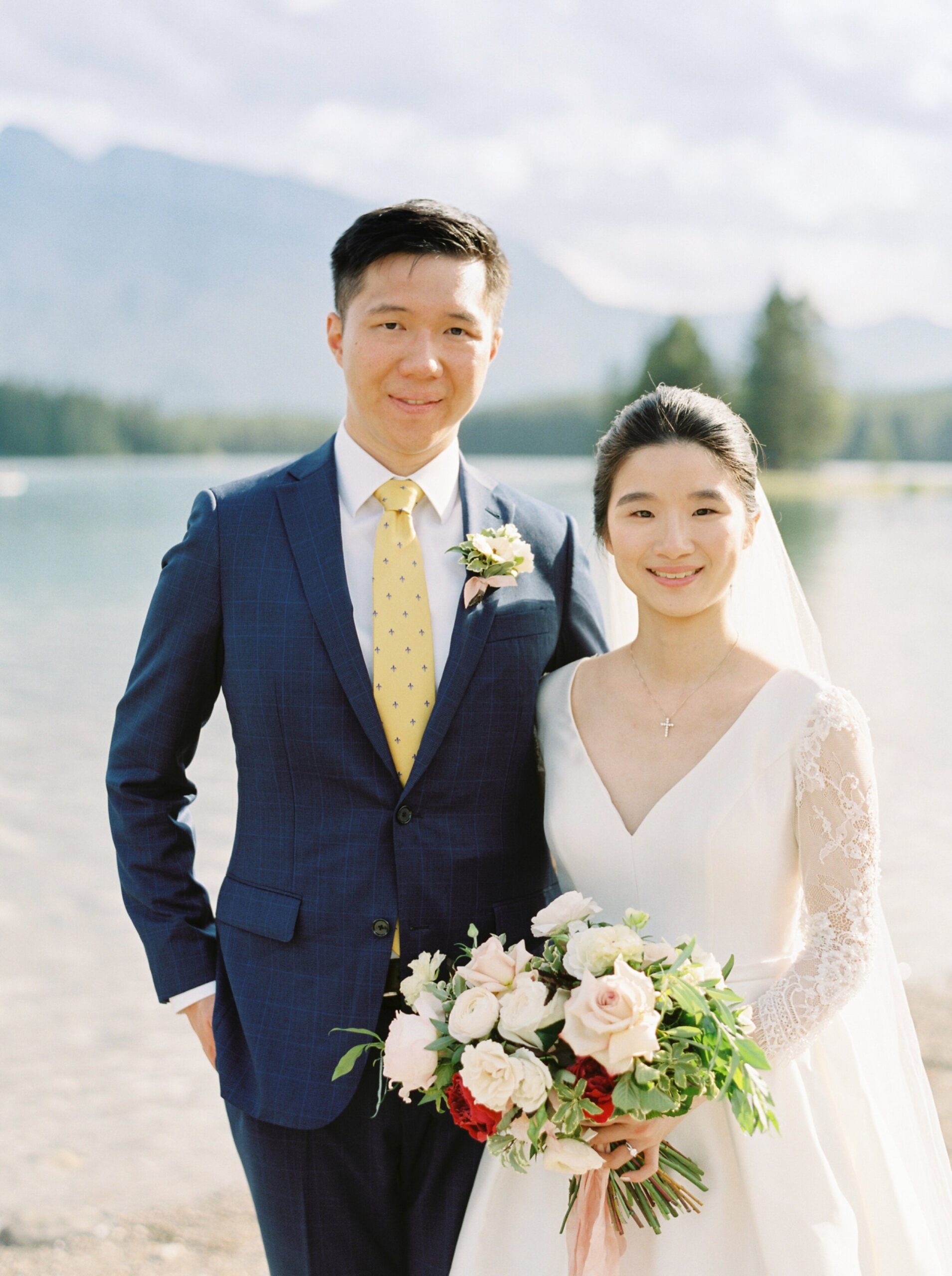  bride and groom portraits pose ideas | two jack lake | Fairmont Banff Springs hotel wedding photographers | fine art film photography | portra 400 