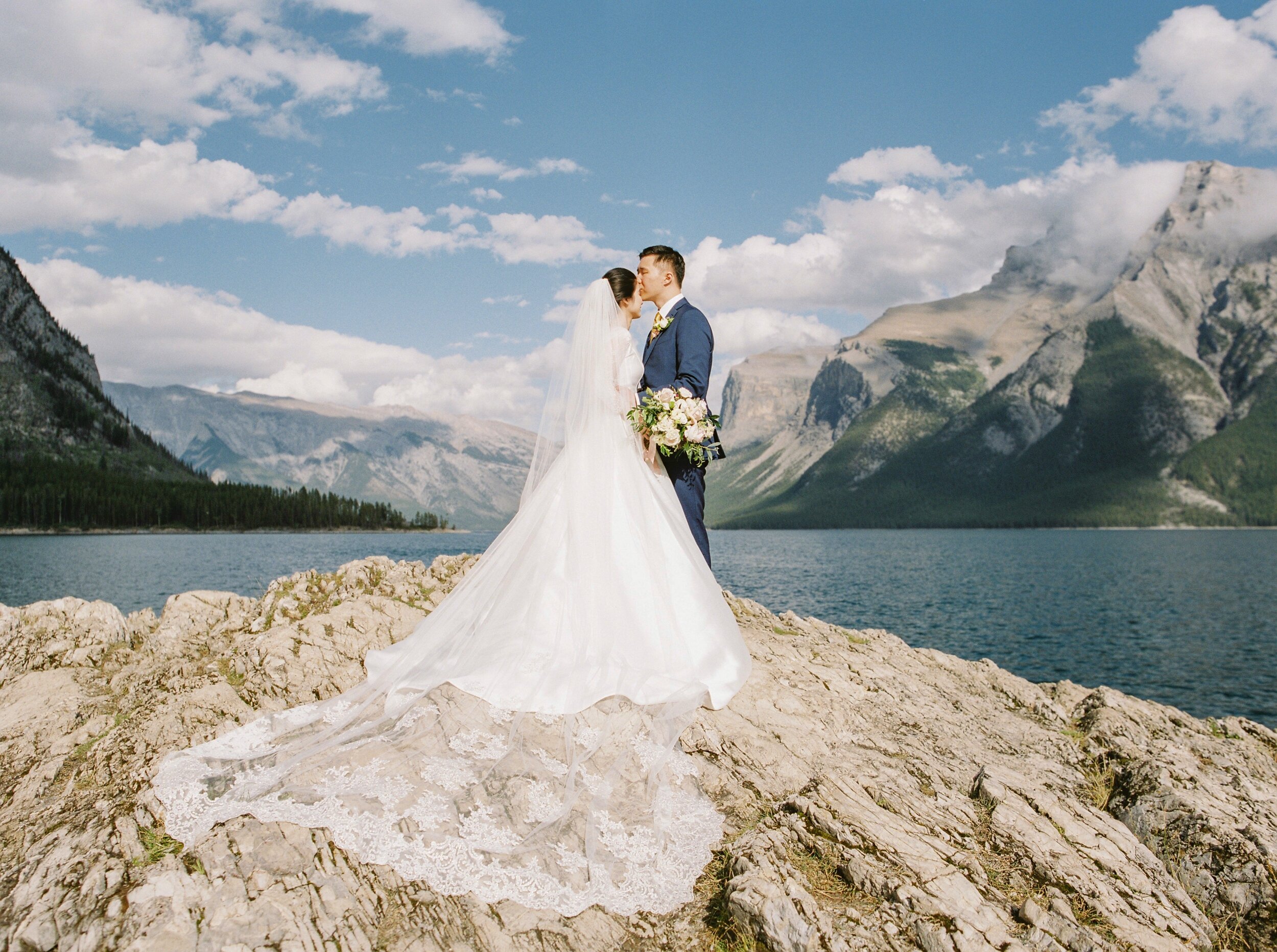  full sun stunning mountain landsape wedding and pre-wedding photo in banff | Fairmont Banff Springs hotel wedding photographers | fine art film photography | portra 400 