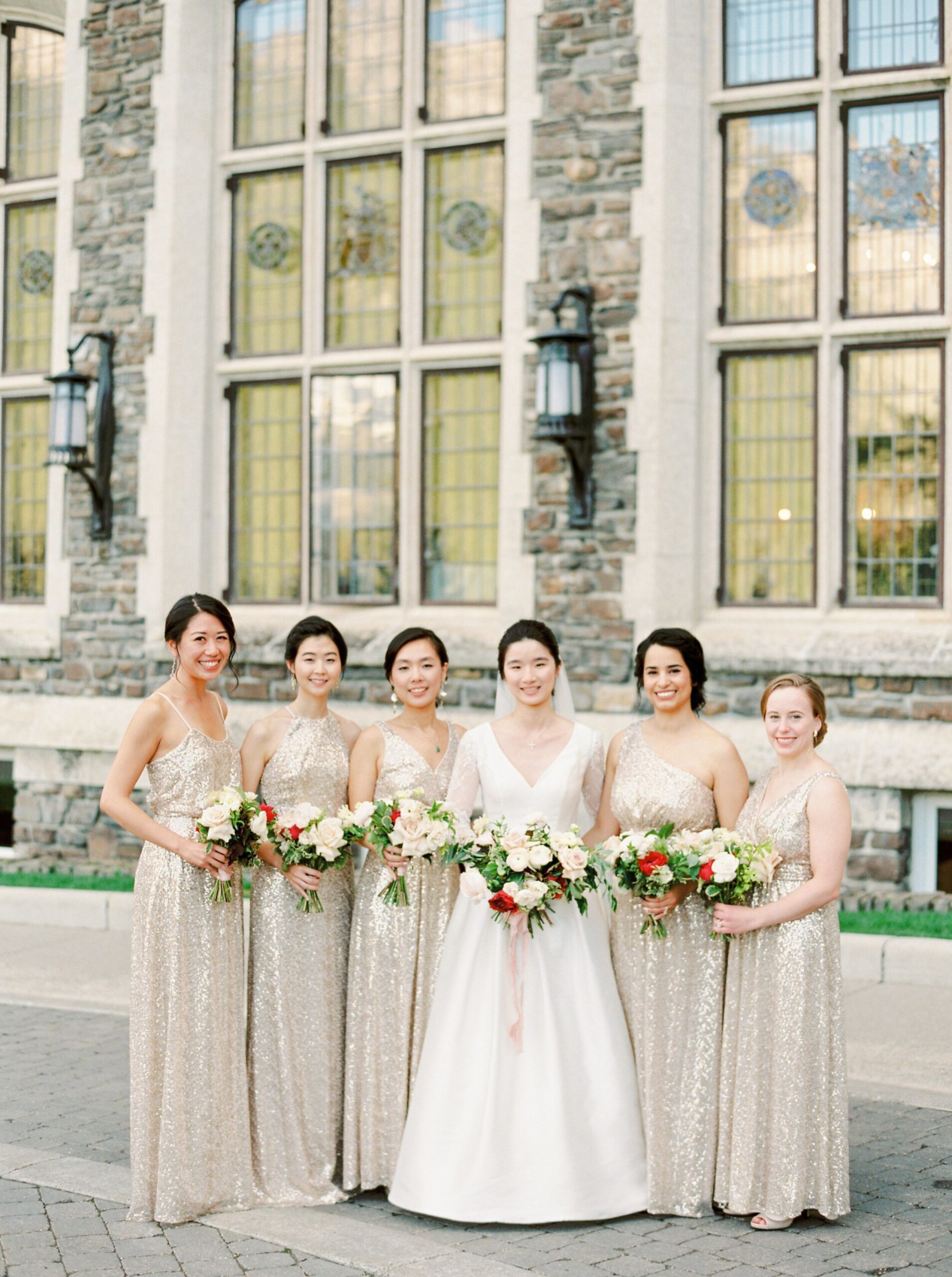  white and red bridal bouquet | gold bridesmaids dress | Fairmont Banff Springs hotel wedding photographers | fine art film photography | portra 400 
