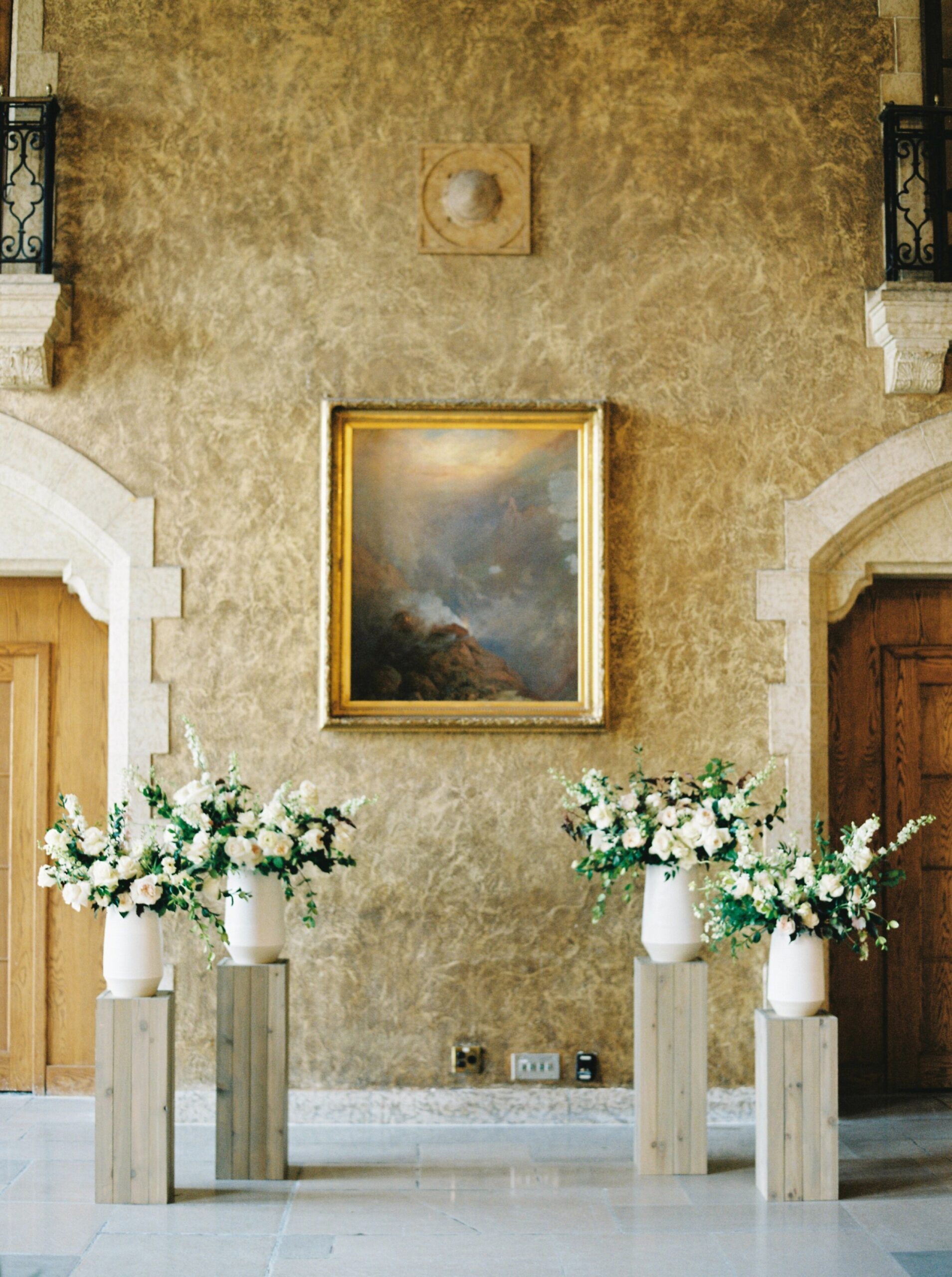  Mount Stephen Hall floral display for wedding ceremony | Fairmont Banff Springs hotel wedding photographers | fine art film photography | portra 400 