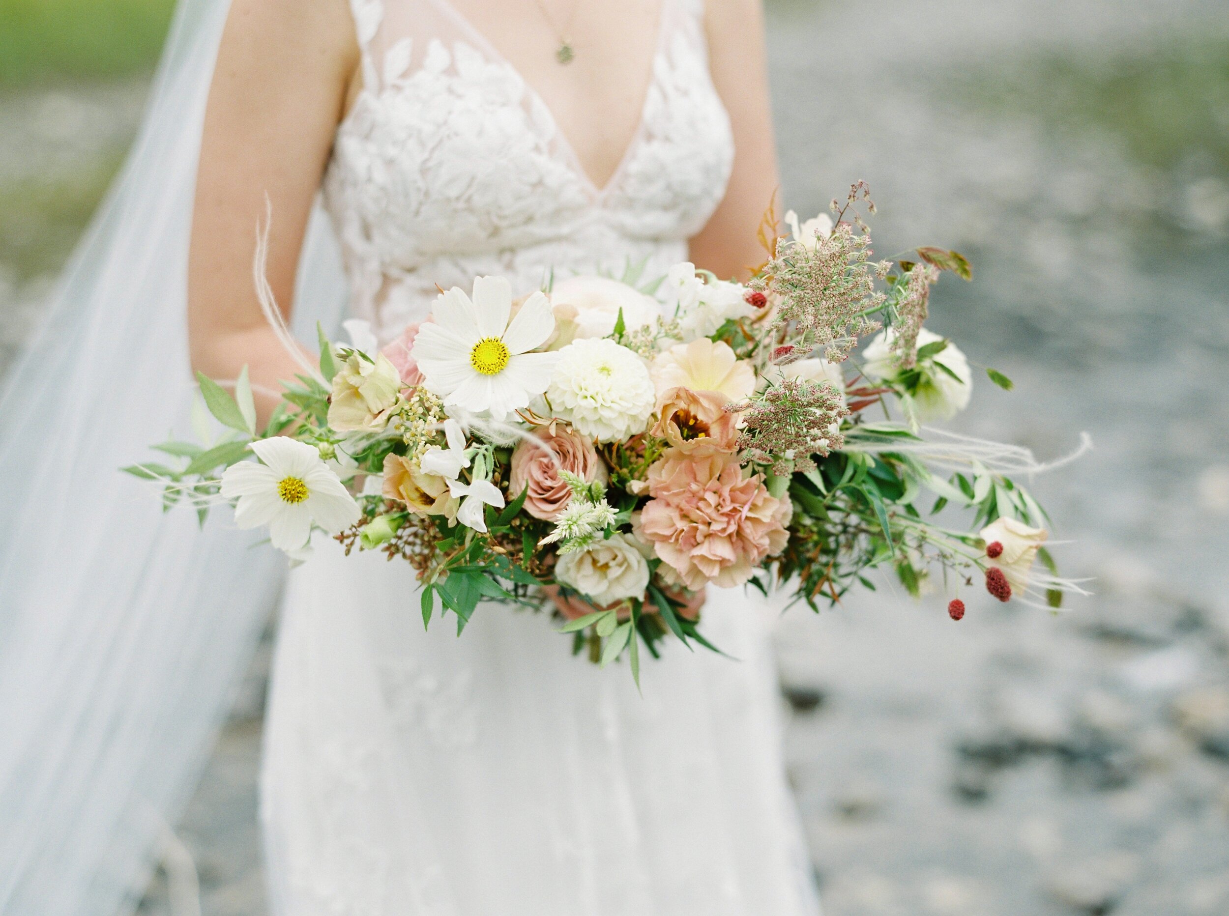  modern light and airy bridal bouquet white and soft pastel caramel colored roses | The Malcom Canmore Wedding Photographer | Fine Art film wedding photoraphy | portra 400 