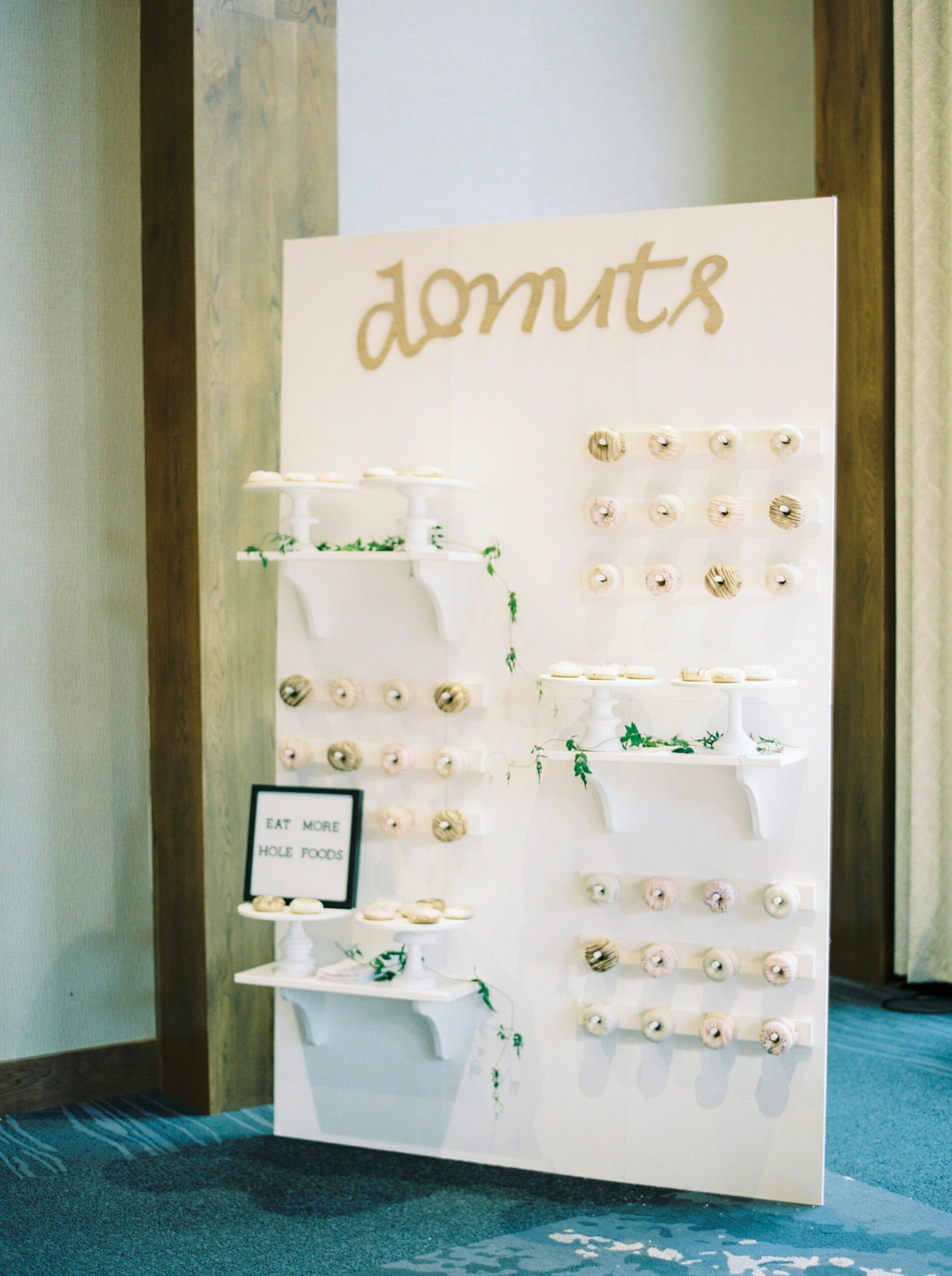  Donut wall reception decor | The Malcom Canmore Wedding Photographer | Fine Art film wedding photoraphy | portra 400 