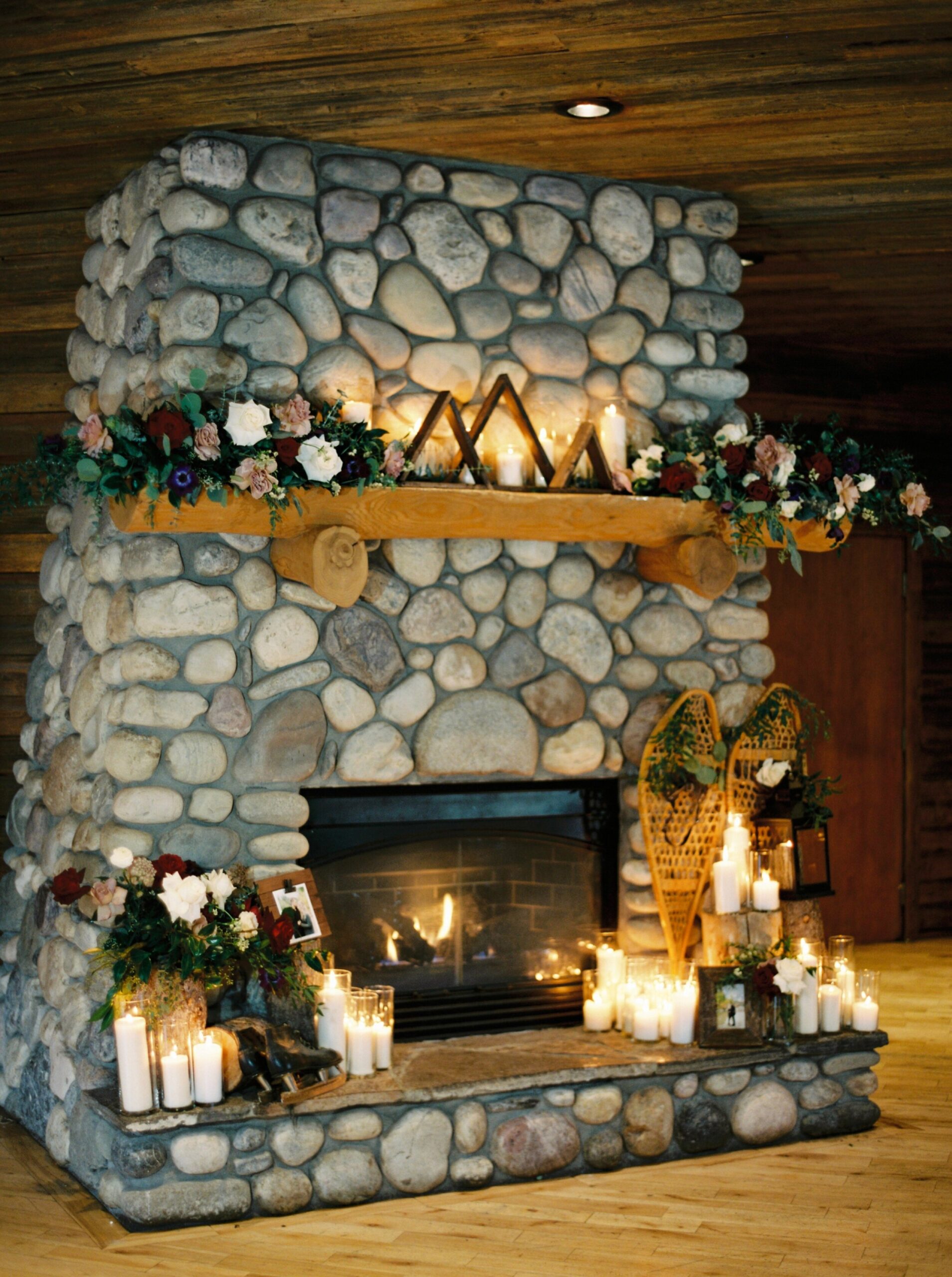  Cozy winter reception decor muller wine and skates and a fire | Cornerstone Theater & Canmore Ranch Wedding Photographers 