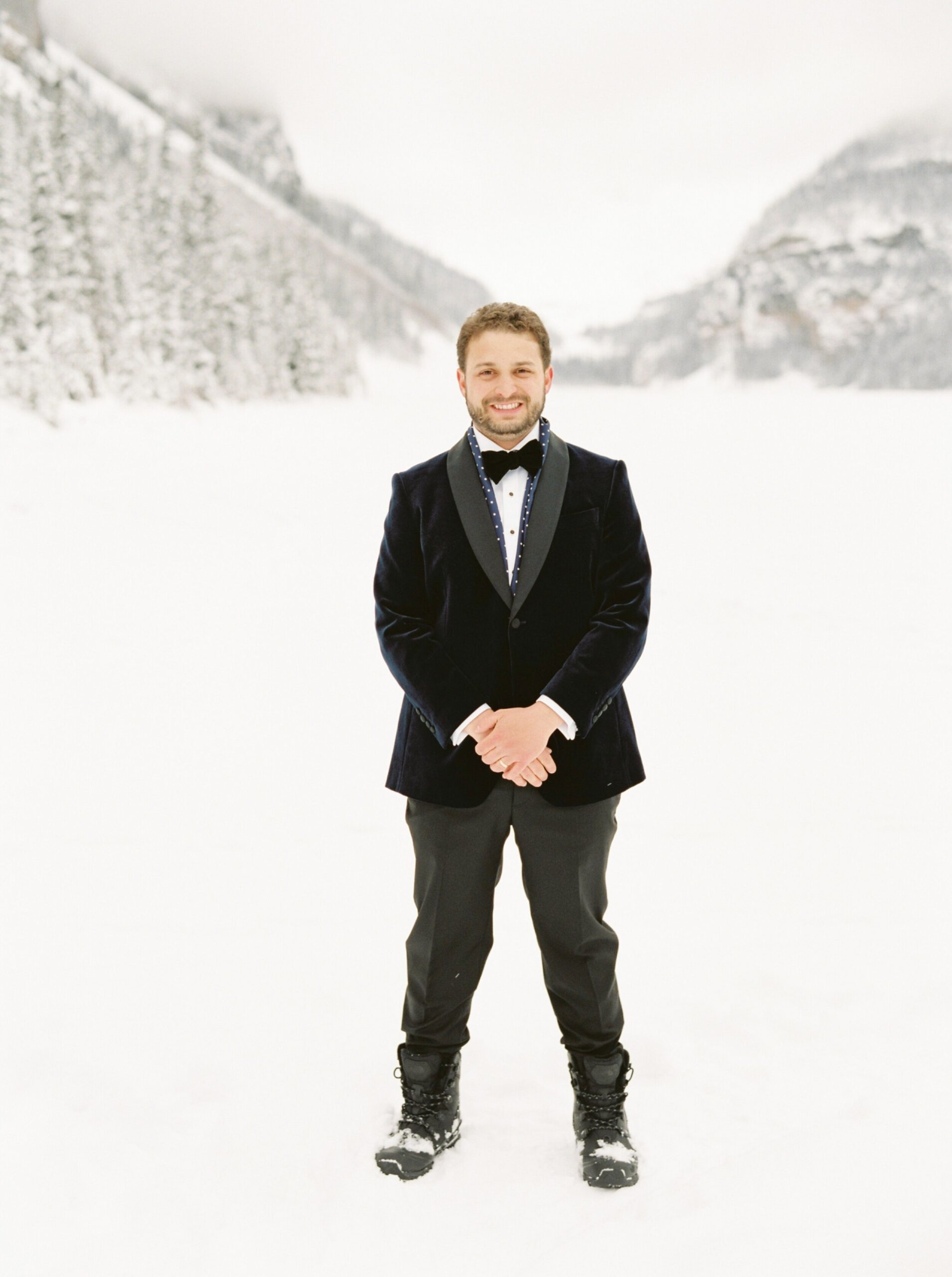  Lake louise winter wonderland wedding | fitted wedding dress with giant bow 