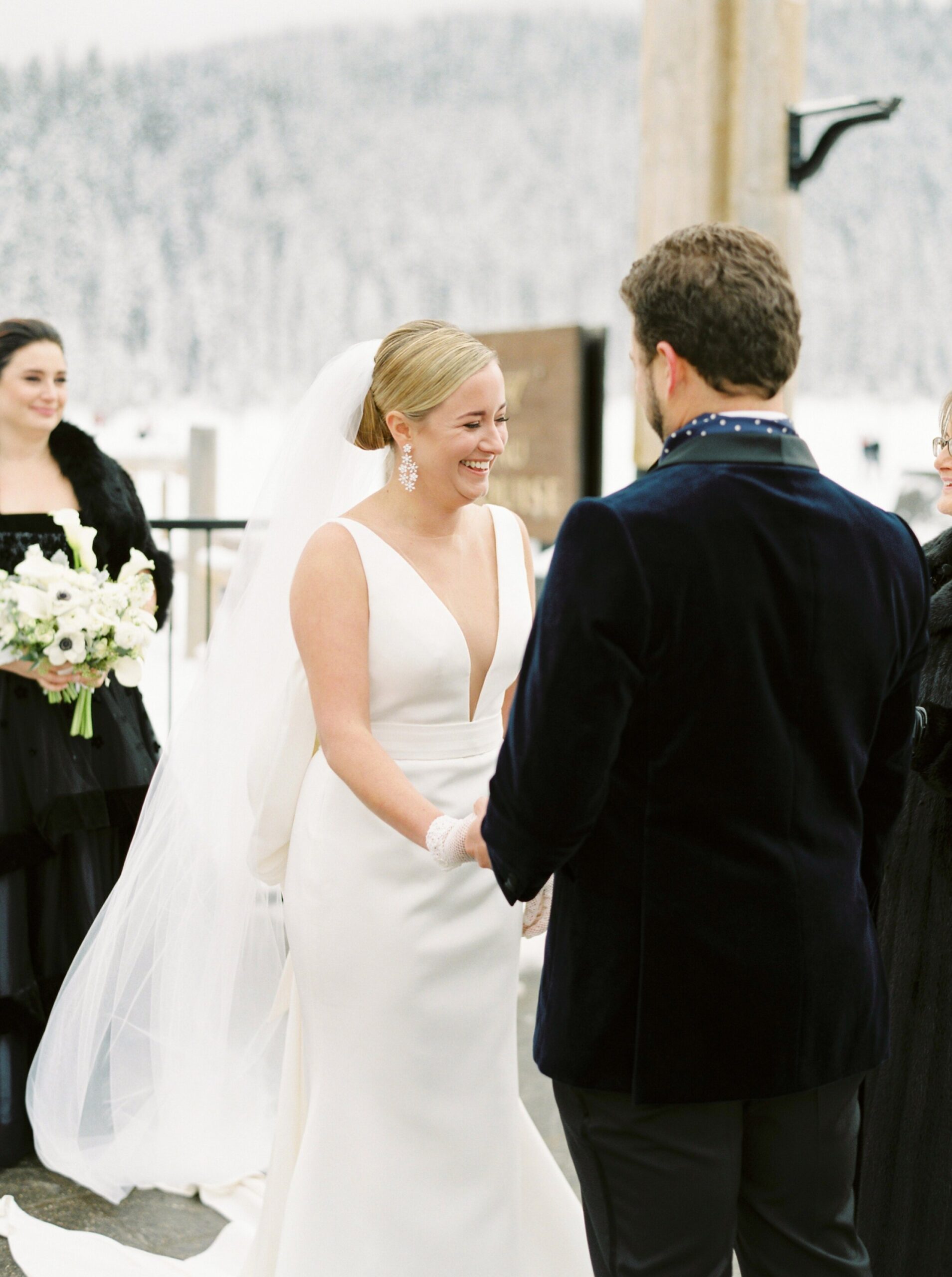  Lake louise winter wonderland wedding | fitted wedding dress with giant bow 