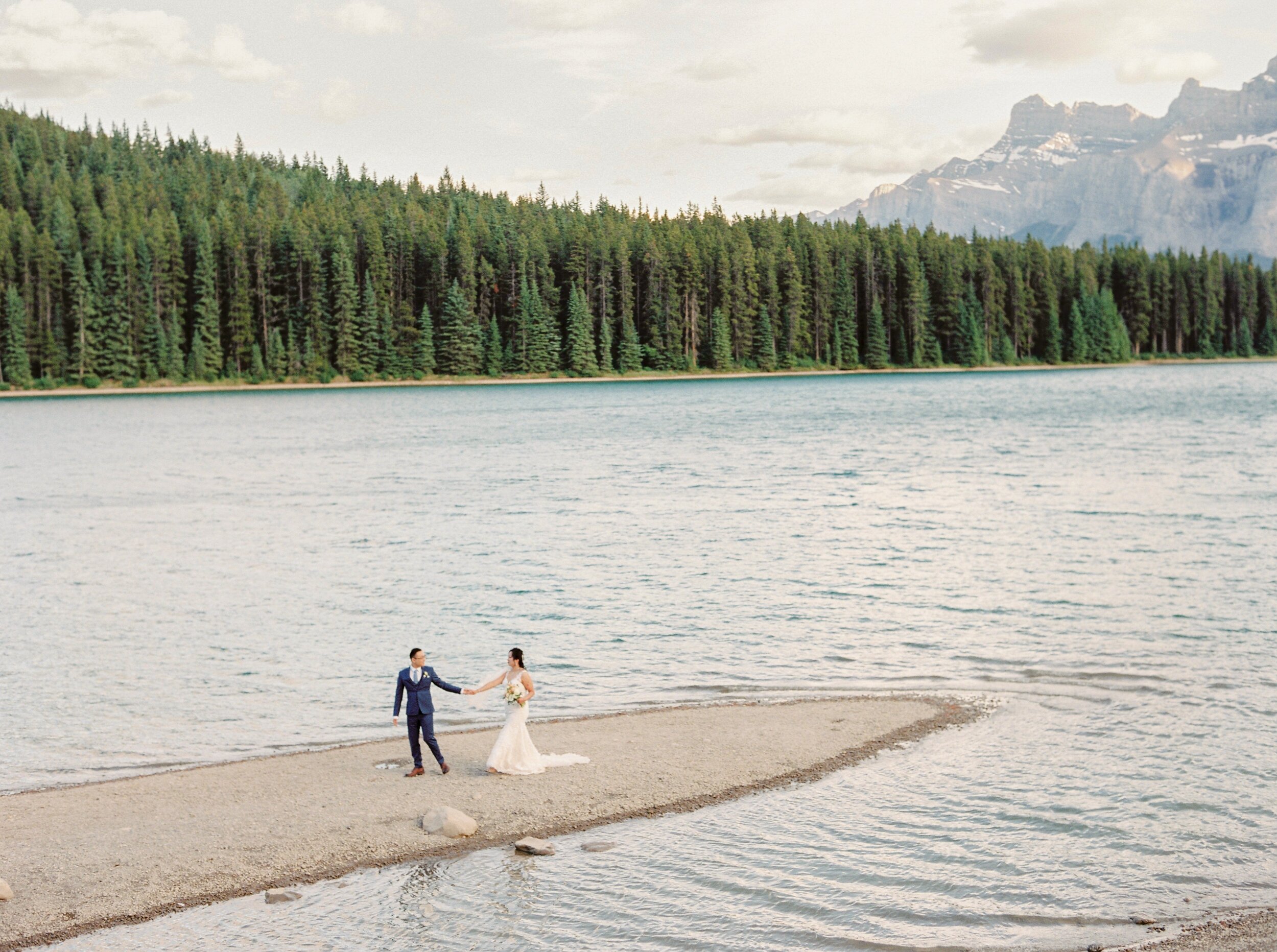  rocky mountain bride | banff wedding photographer | bride and groom pose ideas | landscape wedding photos 