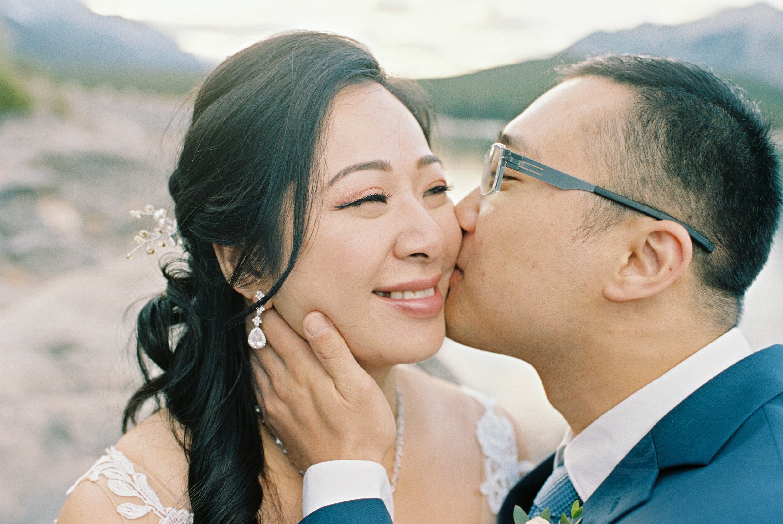  rocky mountain bride | banff wedding photographer | bride and groom pose ideas | landscape wedding photos 