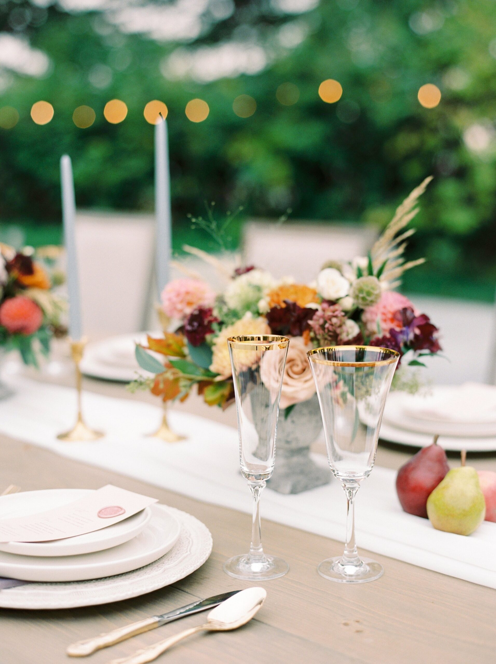  pinks red and purples wedding table inspiration | warm tone wedding editorial in okotoks at Primrose Lifestyle | calgary fine art film wedding photographer 