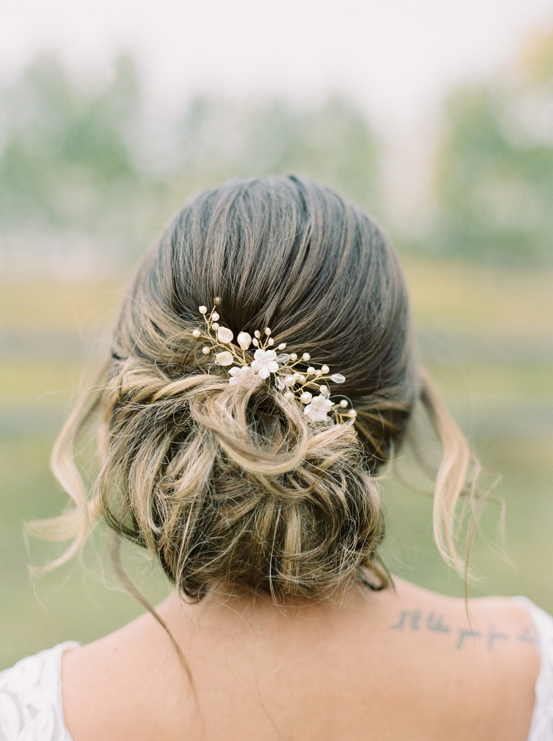  bridal hairstyles updo | warm tone wedding editorial in okotoks at Primrose Lifestyle | calgary fine art film wedding photographer 