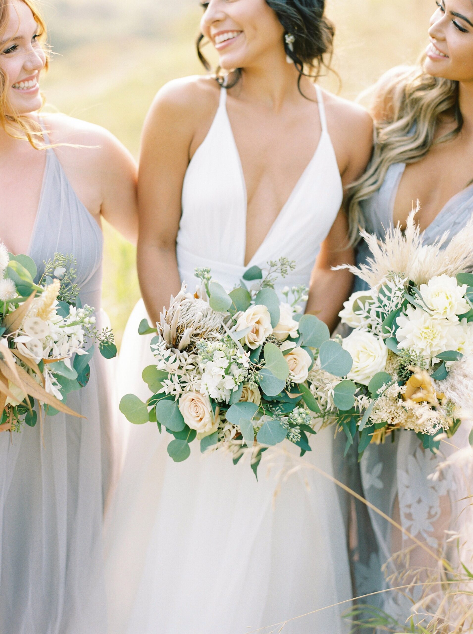  bride and bridesmaids in dusty purple lavender with boho florals | Rocky Mountain Bride Magazine Feature | The Rdige Okotoks Bridal Editorial | Boho hats | film photographer 