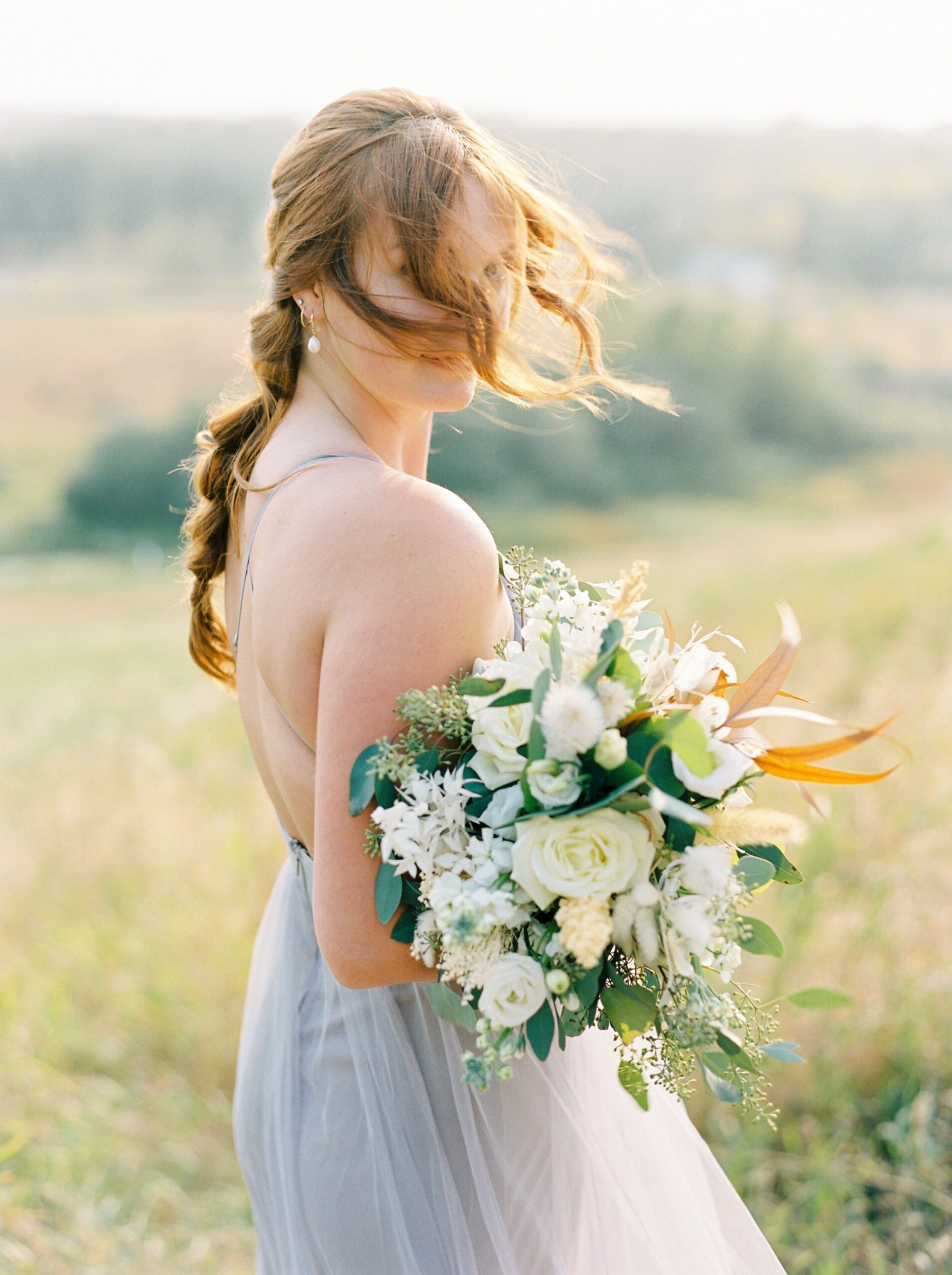  wind swept braided hair bridesmaids style | Rocky Mountain Bride Magazine Feature | The Rdige Okotoks Bridal Editorial | Boho hats | film photographer 
