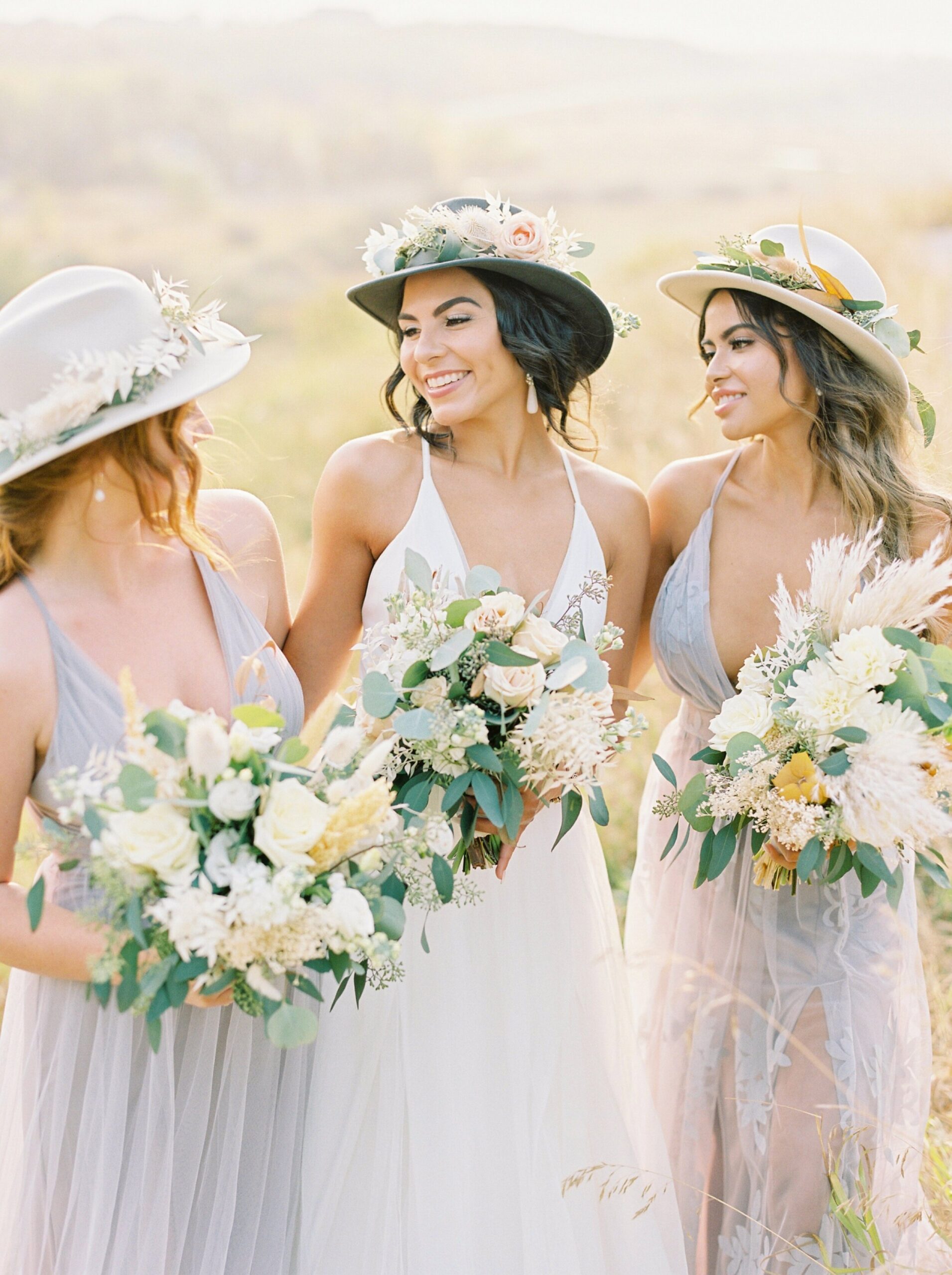  Bridesmaids in dusty lavender grey maxi dress with hats | Rocky Mountain Bride Magazine Feature | The Rdige Okotoks Bridal Editorial | Boho hats | film photographer 